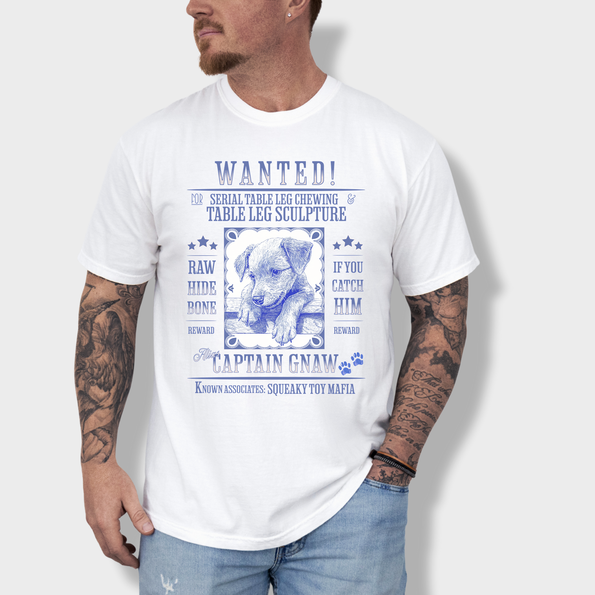 Vintage wanted poster T-shirt featuring a mischievous puppy chewing a shoe, wanted for destruction of property.