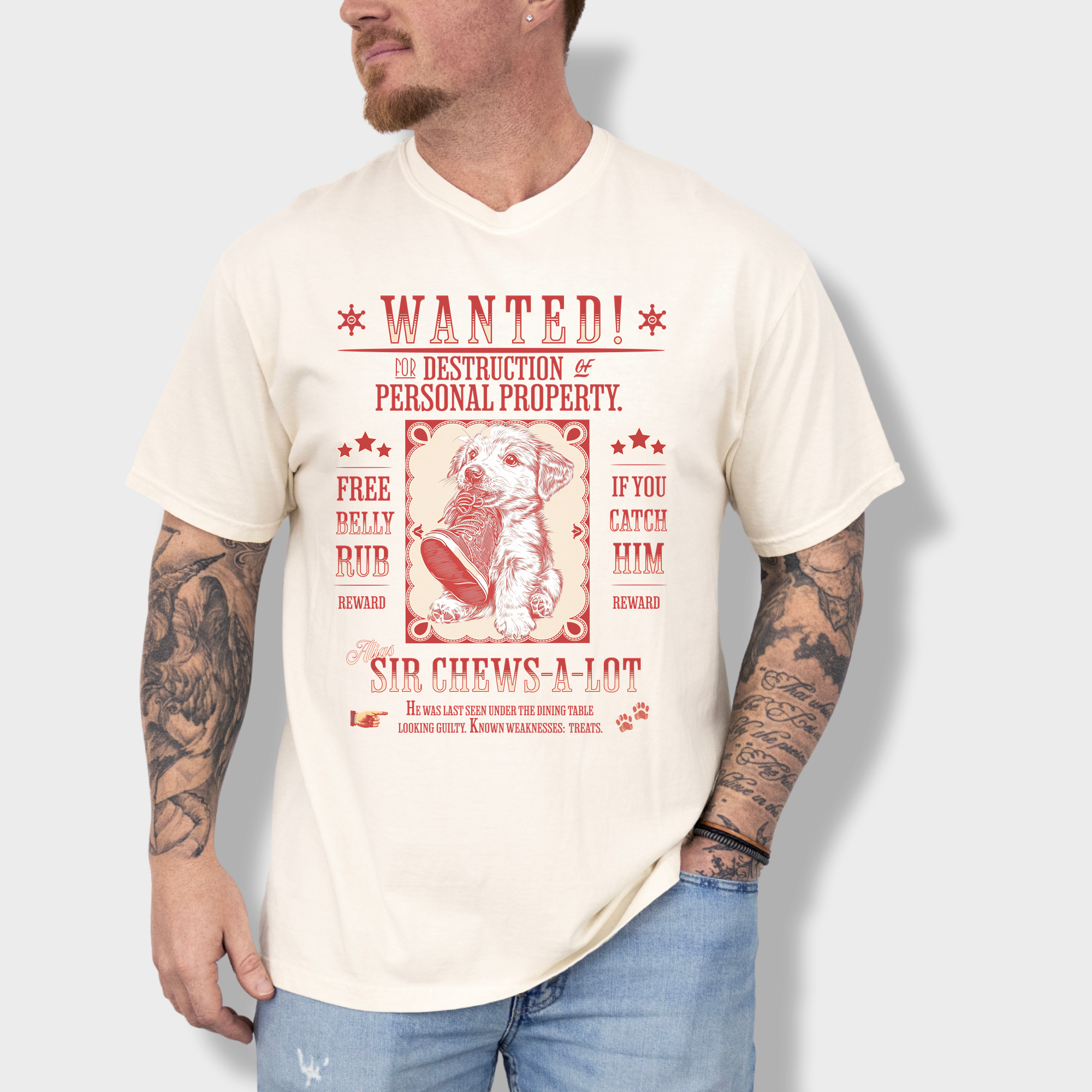 Soft cotton T-shirt featuring a playful puppy wanted for 'destruction of property' in a classic Wild West poster design.