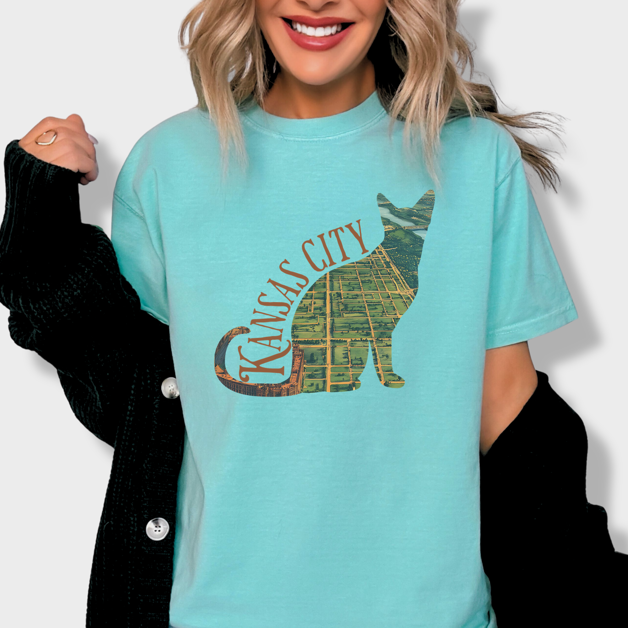 Retro-inspired cat lover’s T-shirt showcasing a detailed vintage map of Kansas City, MO, shaped like a feline silhouette.