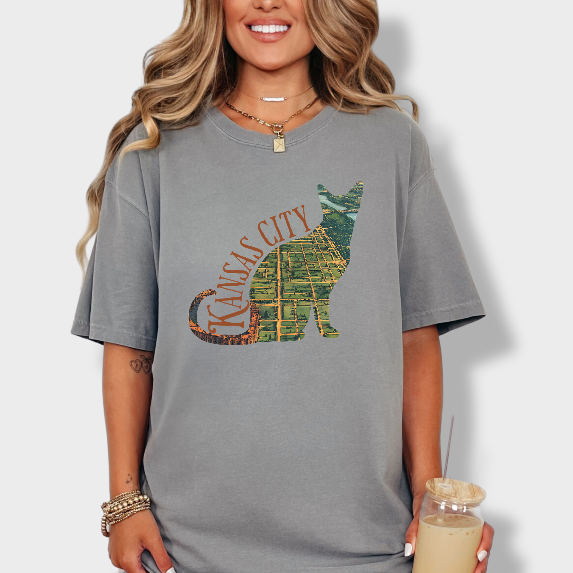 Retro-inspired cat lover’s T-shirt showcasing a detailed vintage map of Kansas City, MO, shaped like a feline silhouette.