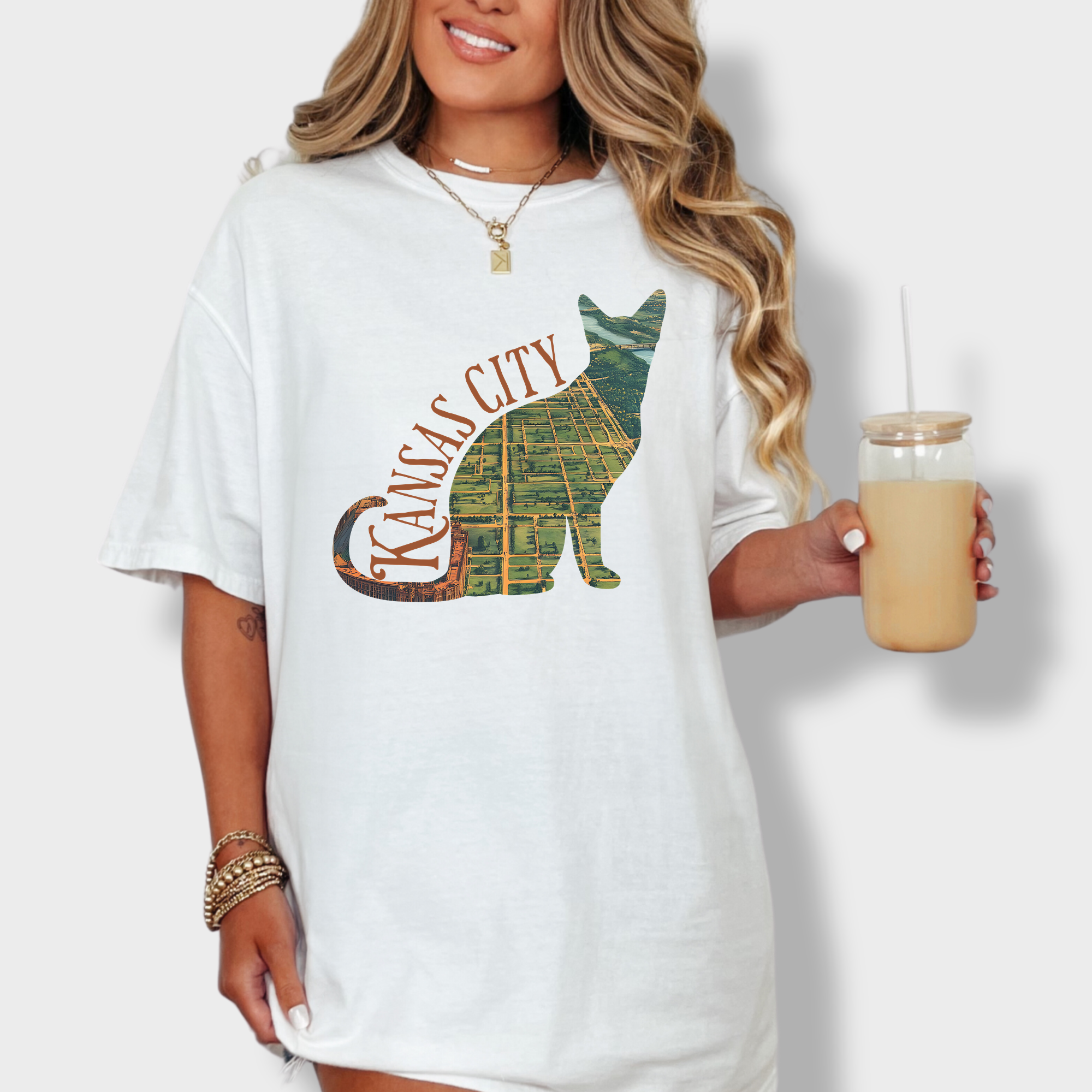 Creative Kansas City map T-shirt with a vintage satellite image of the city shaped within a striking cat silhouette.