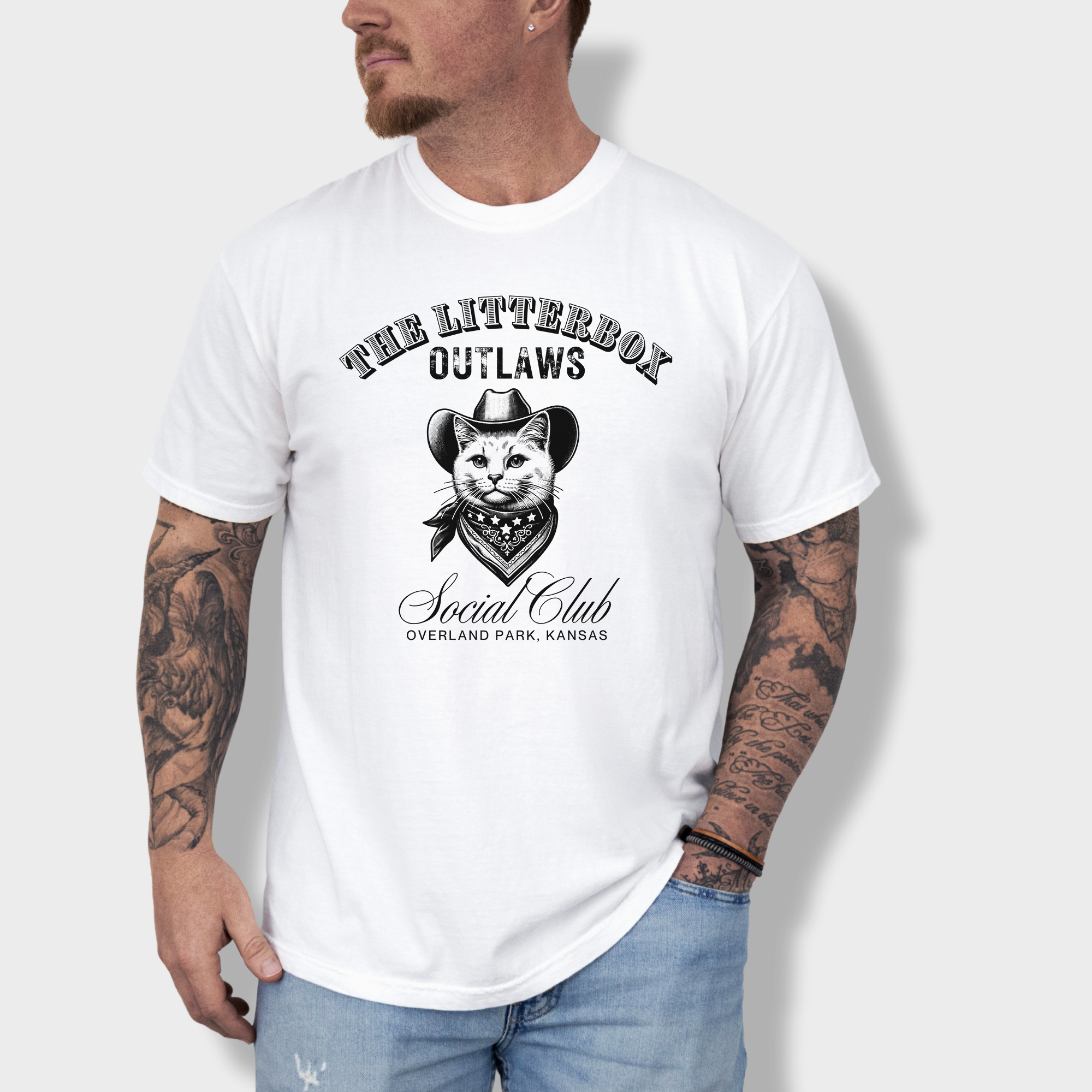 Funny outlaw cat graphic tee with a cowboy-hat-wearing feline and a customizable 'Litterbox Outlaws Social Club' location.