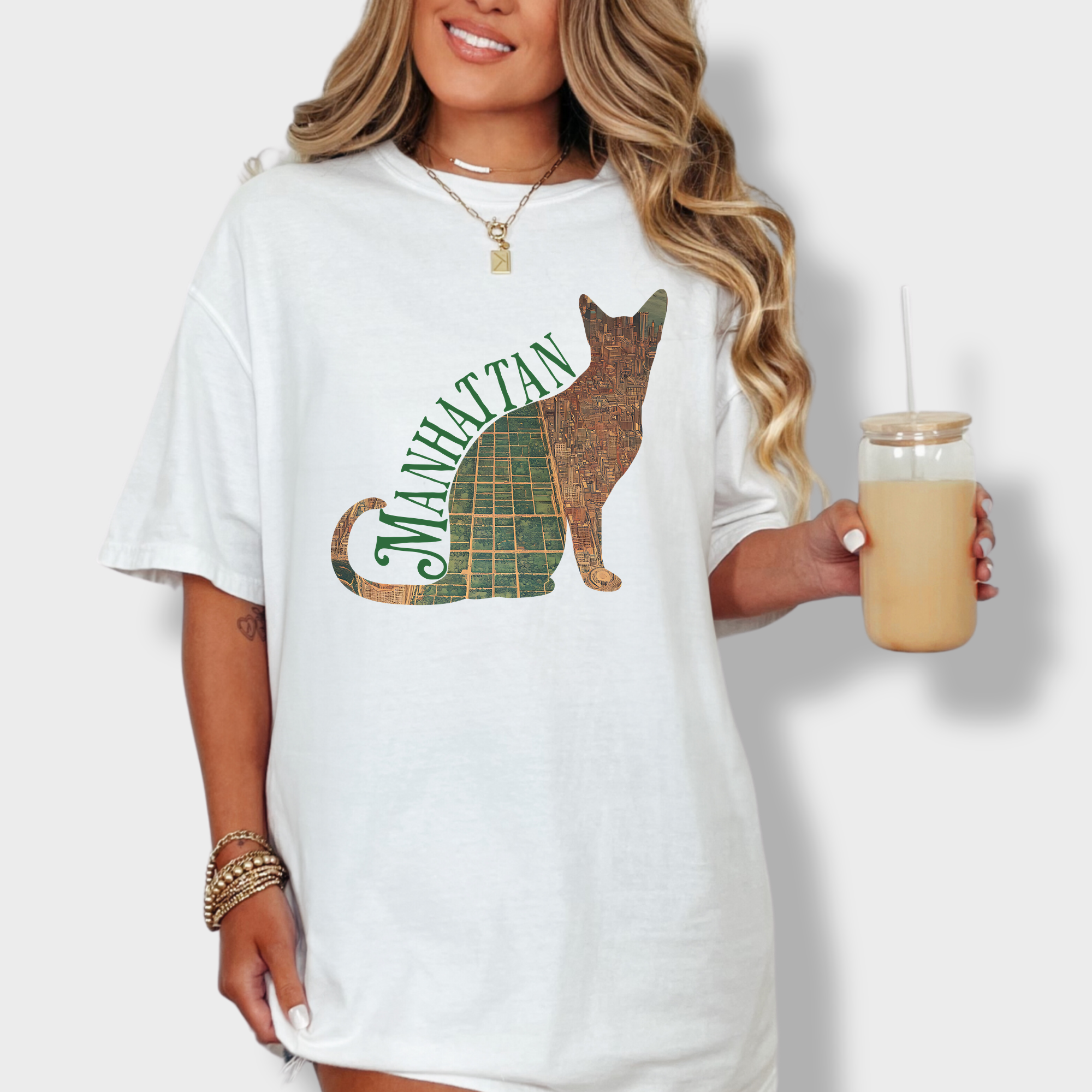 Retro-inspired cat lover’s T-shirt showcasing a detailed vintage map of NYC shaped like a feline silhouette.