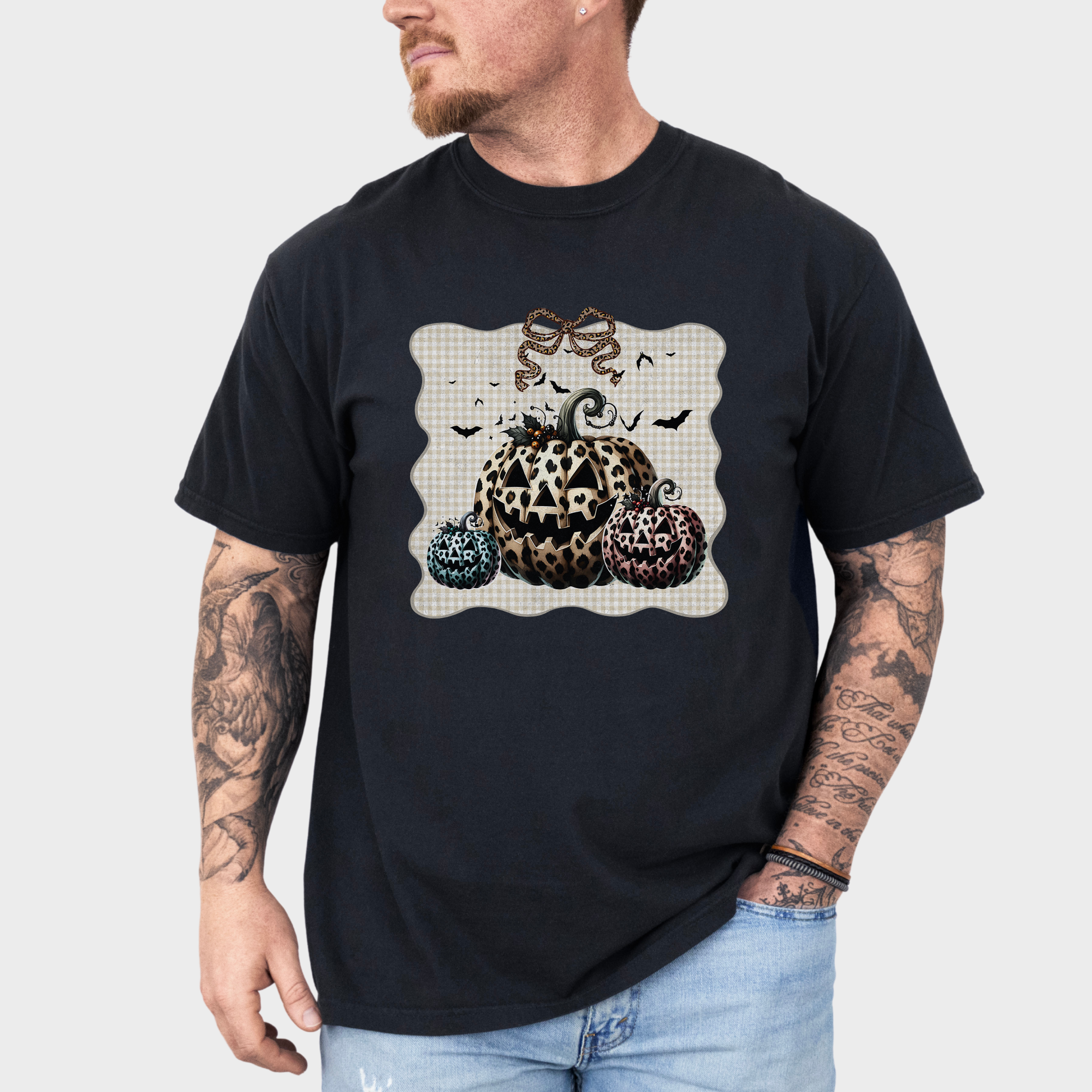 Western Preppy Leopard Print Jack-O-Lanterns Cat Bow Comfort Colors T-Shirt in Black