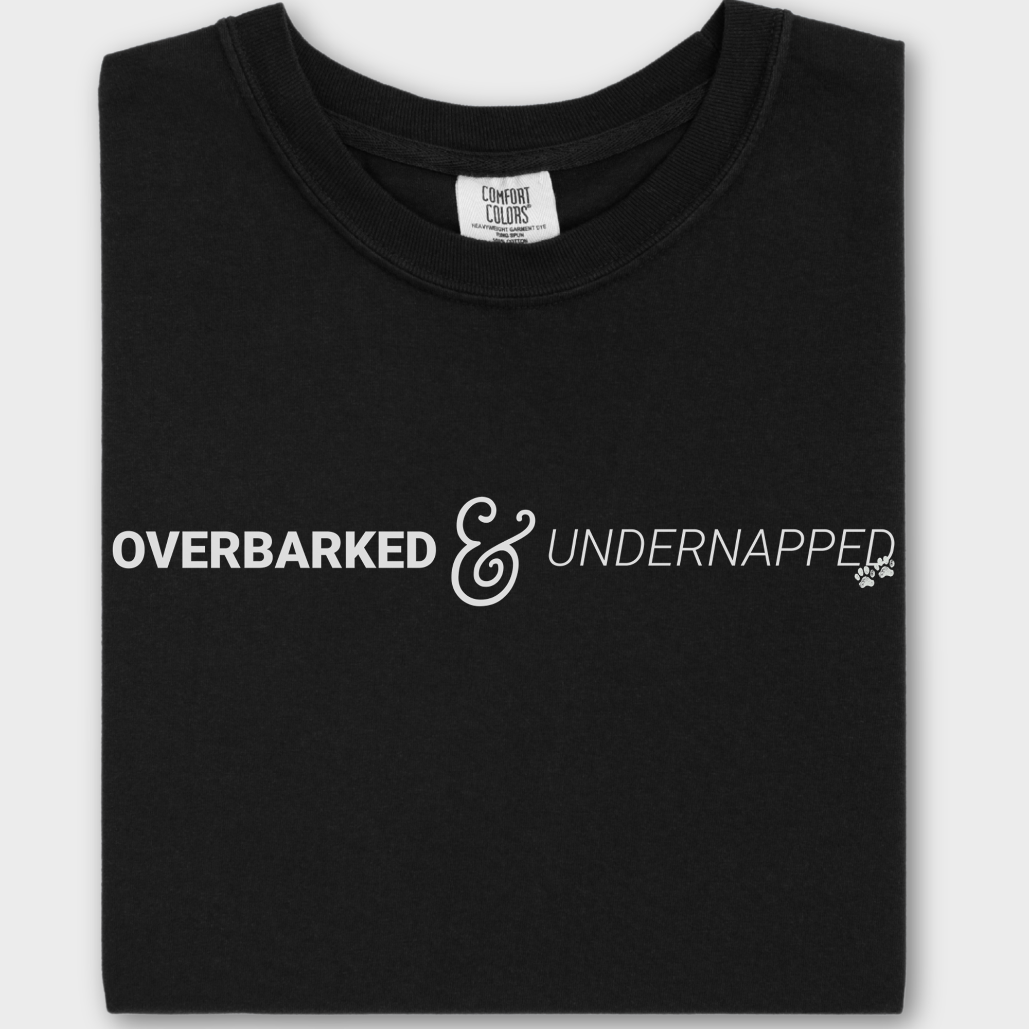 Soft cotton T-shirt for dog owners, showcasing a relatable pet parent message with a simple paw print design.
