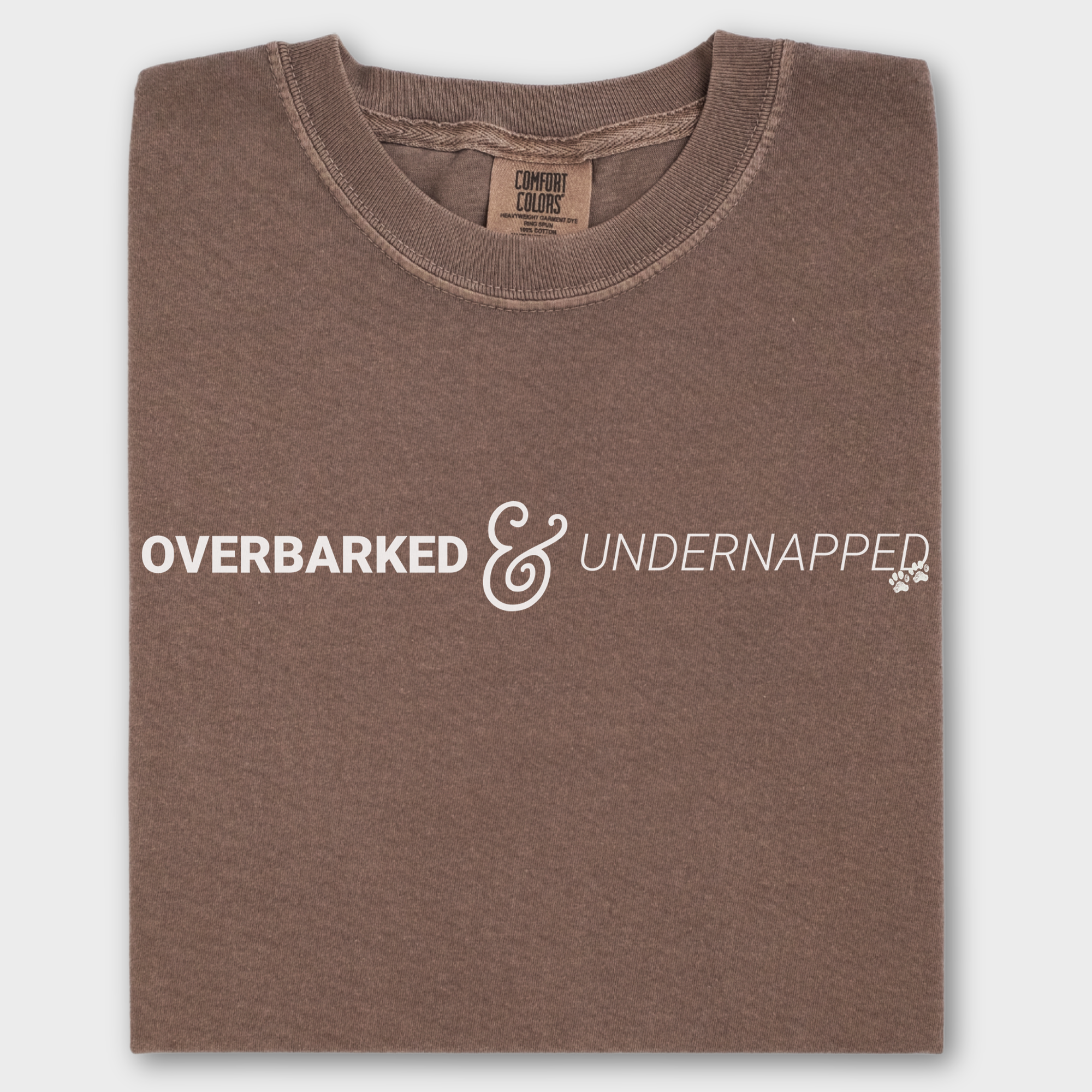 Soft cotton T-shirt for dog owners, showcasing a relatable pet parent message with a simple paw print design.