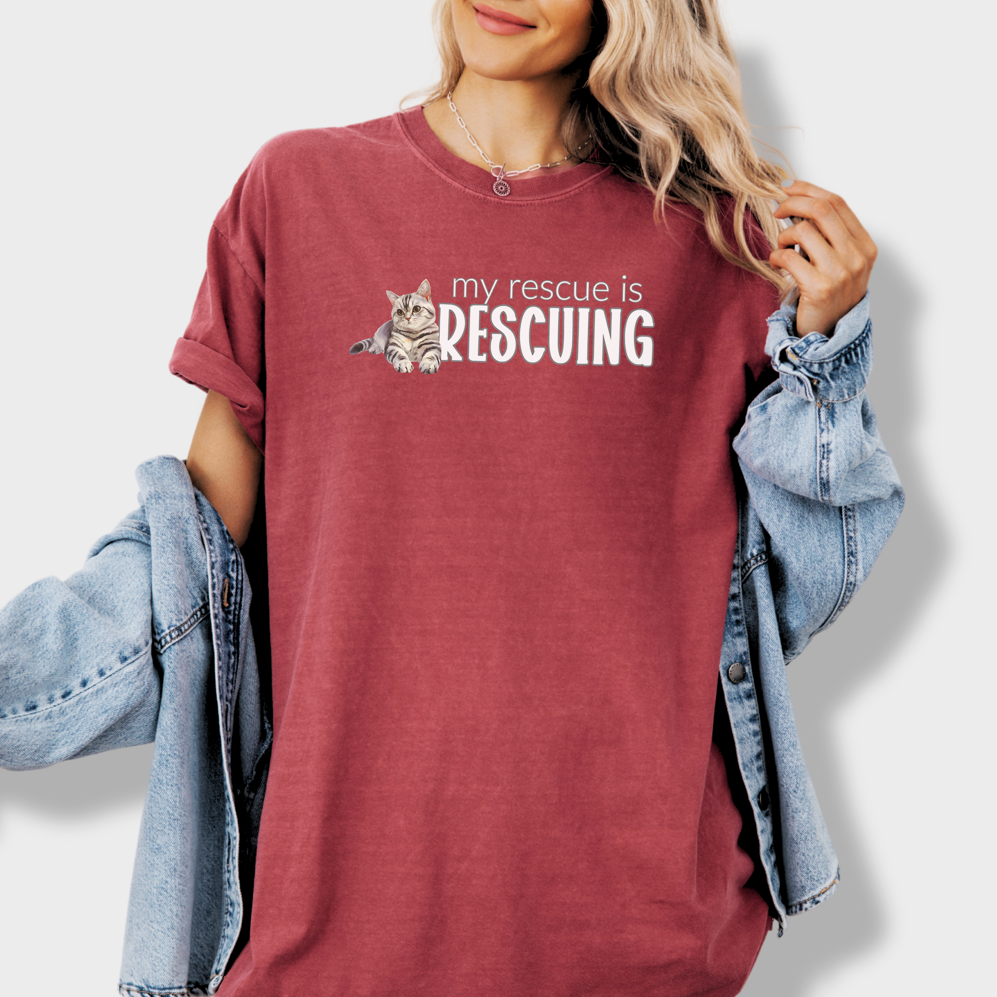 Artistic rescue cat lover’s tee featuring a dreamy watercolor design and uplifting text celebrating adopted pets.