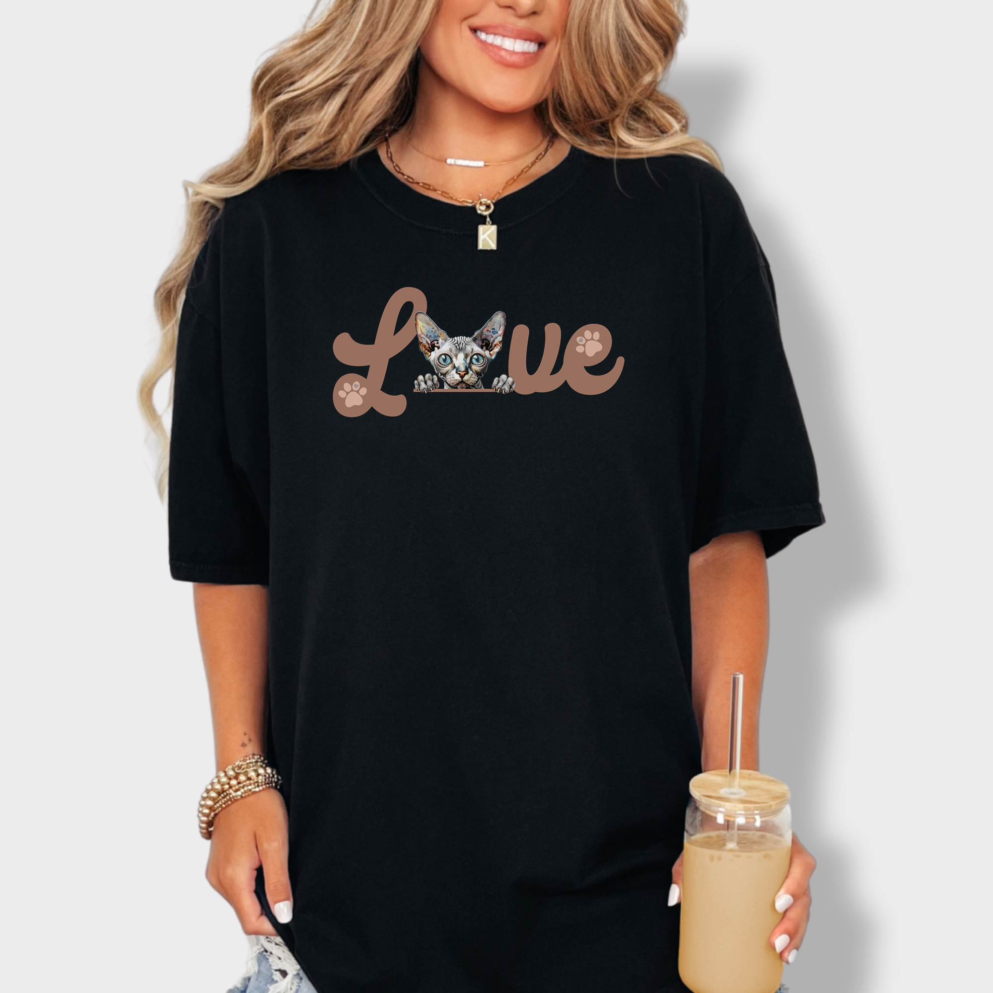 Retro-inspired Sphynx cat lover T-shirt with a stylish minimalist L-O-V-E graphic, perfect for cat parents.