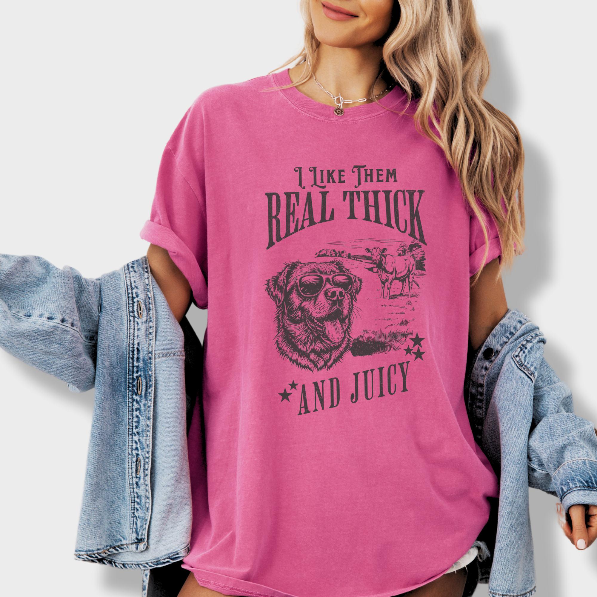 Soft cotton T-shirt featuring a humorous dog and cow design with the text 'I like them real thick and juicy,' inspired by classic hip-hop