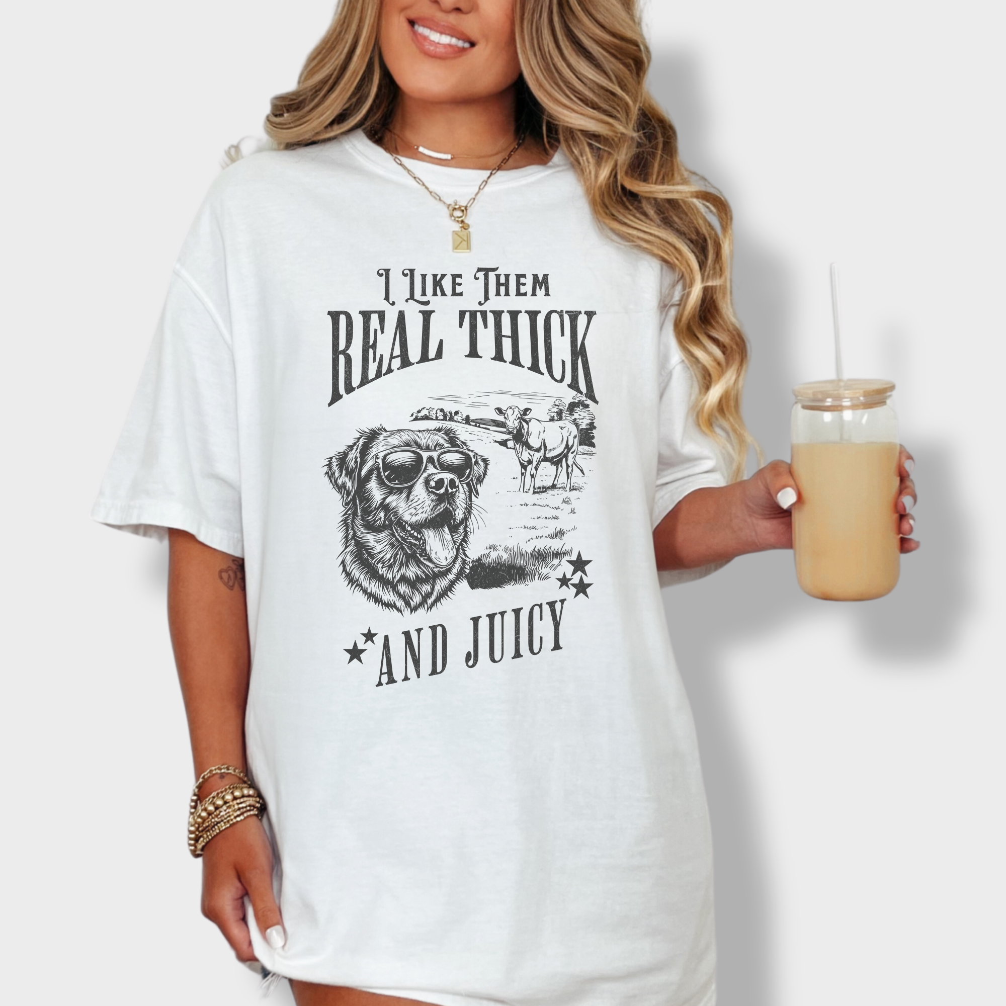 Minimalist line-art dog and cow graphic tee with humorous text, nodding to 90s hip-hop lyrics.