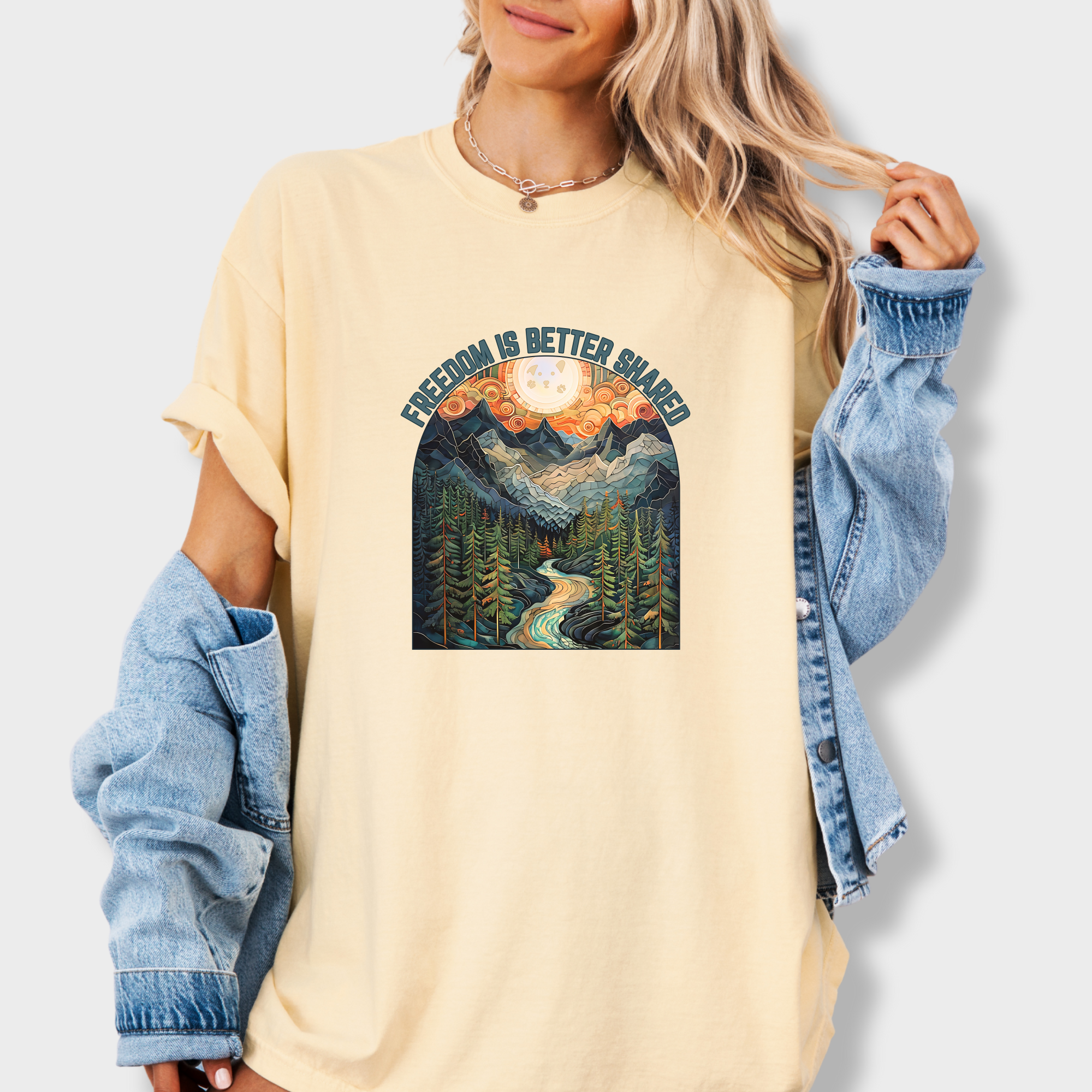 artistic-mountain-freedom-is-better-shared-stained-glass-version-dog-graphic-comfort-colors-t-shirt-in-butter - Butter Lifestyle Female Model