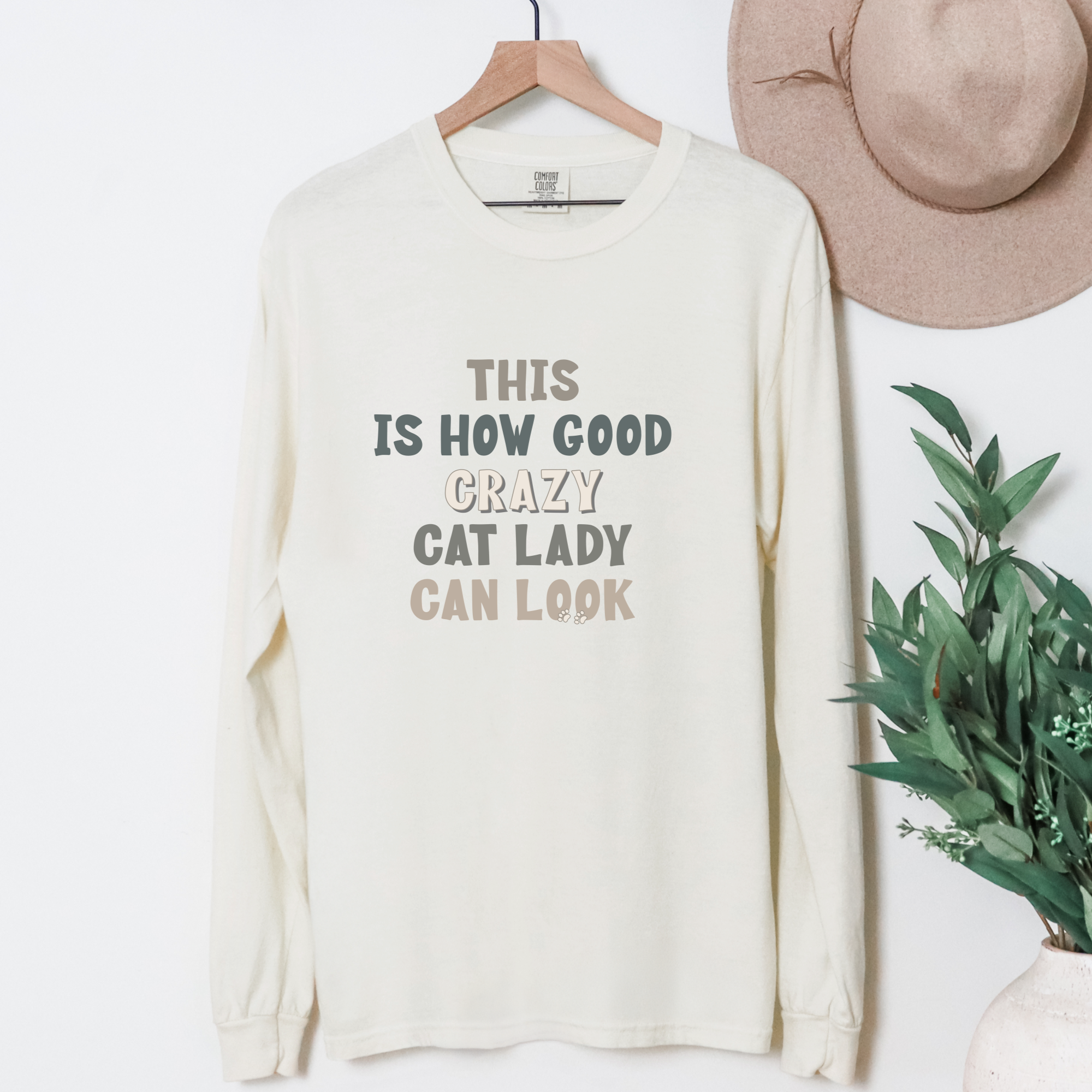 fetch-n-found unisex tee for men and women featuring , This Is How Good Crazy Cat Lady Can Look Ivory graphic T-Shirt made of 100% cotton - Ivory Hanging Front