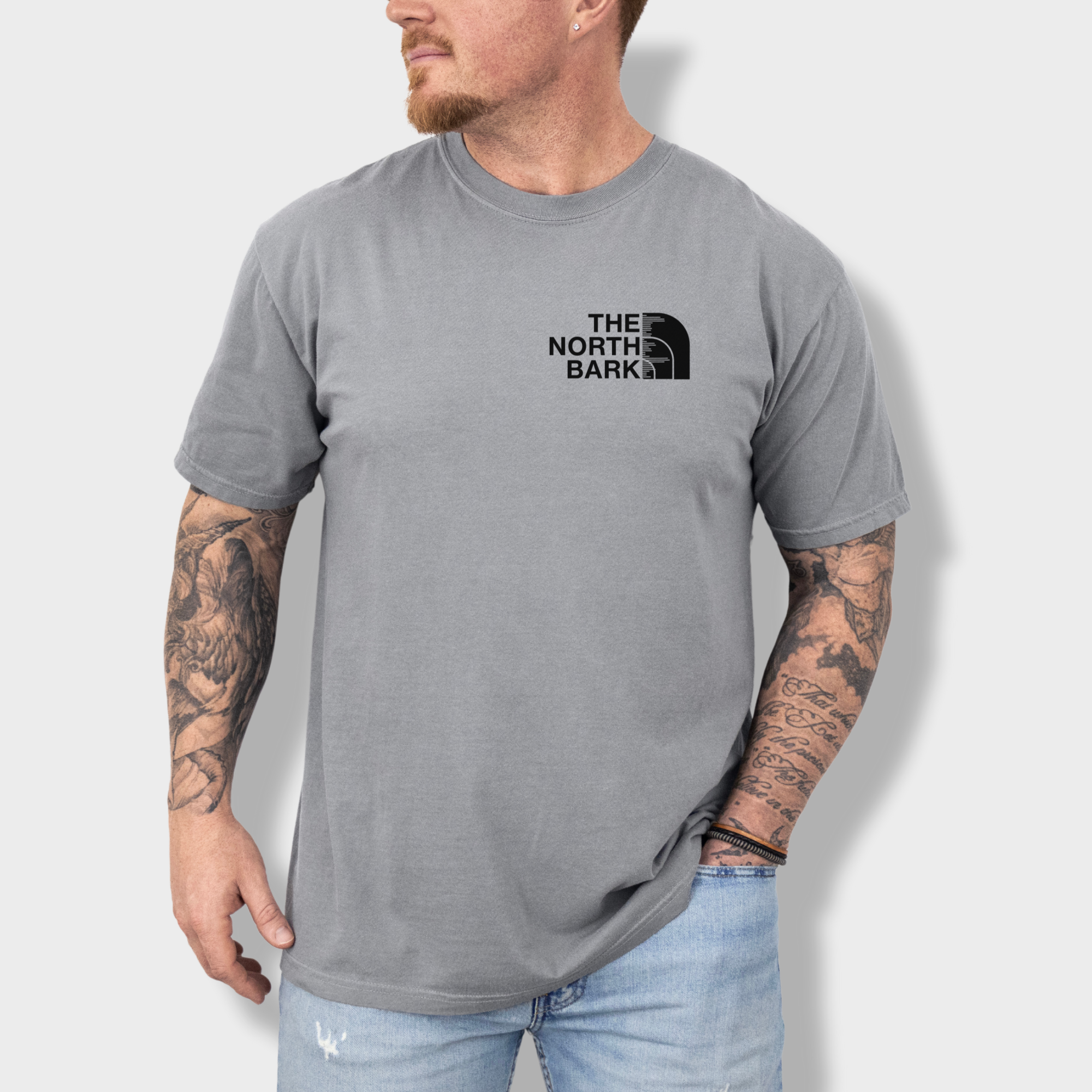 artistic-the-north-bark-dog-graphic-comfort-colors-t-shirt-in-grey - Grey Lifestyle Male Model