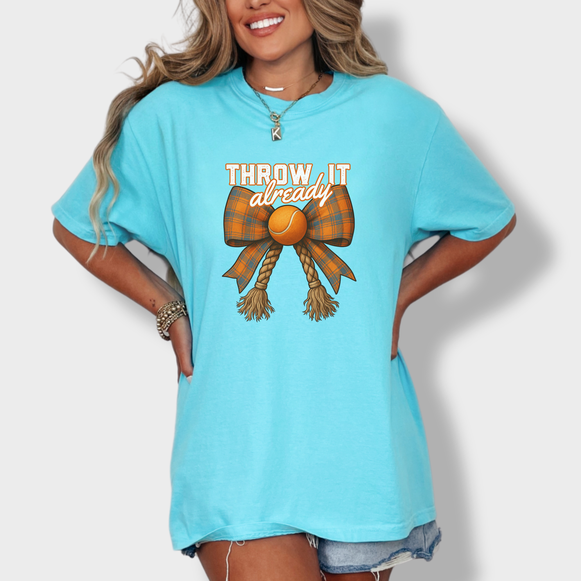 western-throw-it-already-dog-chew-toy-bow-dog-bow-comfort-colors-t-shirt-in-lagoon-blue - Lagoon Blue Lifestyle Female Model