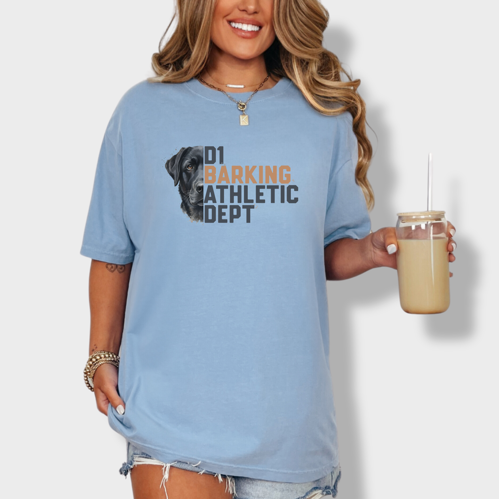 fetch-n-found unisex tee for men and women featuring , D1 Barking Athletic Department Washed Denim graphic T-Shirt made of 100% cotton - Washed Denim Lifestyle Female Model