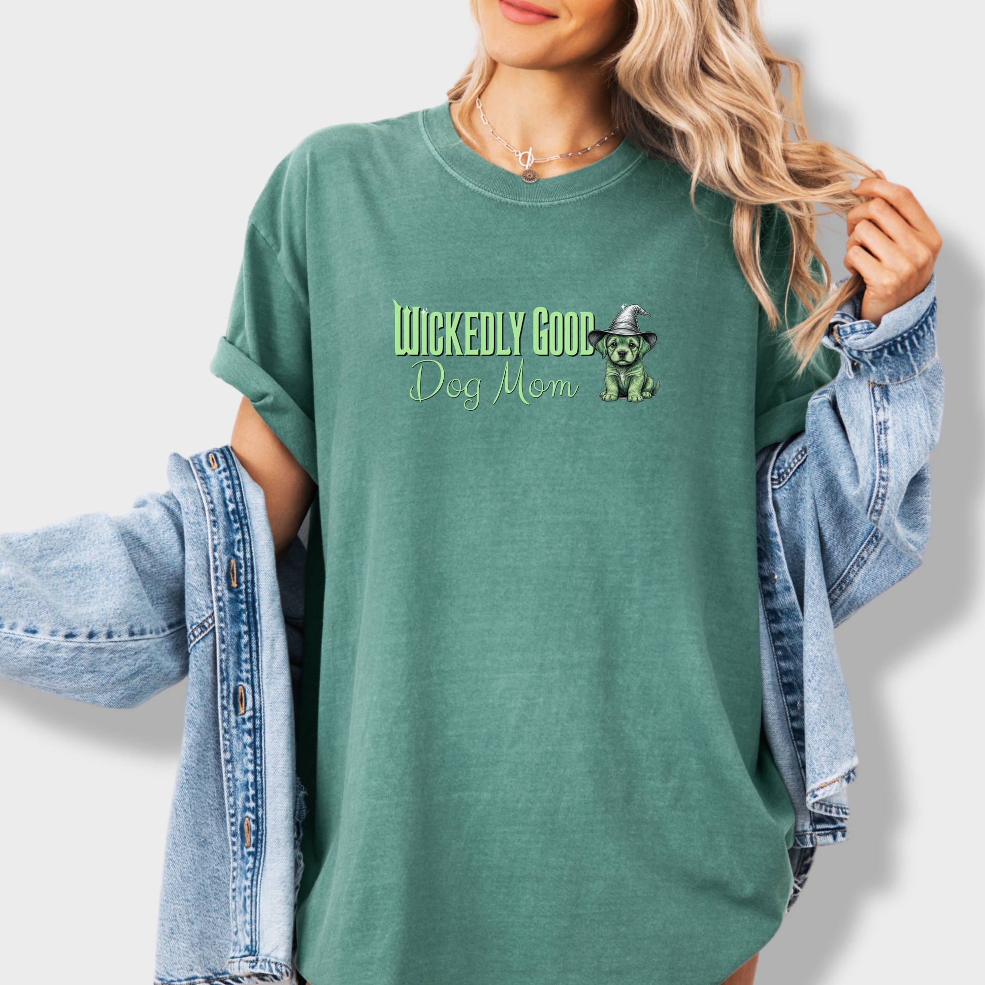 movie-inspired-green-wickedly-good-dog-mom-dog-graphic-comfort-colors-t-shirt-in-light-green - Light Green Lifestyle Female Model