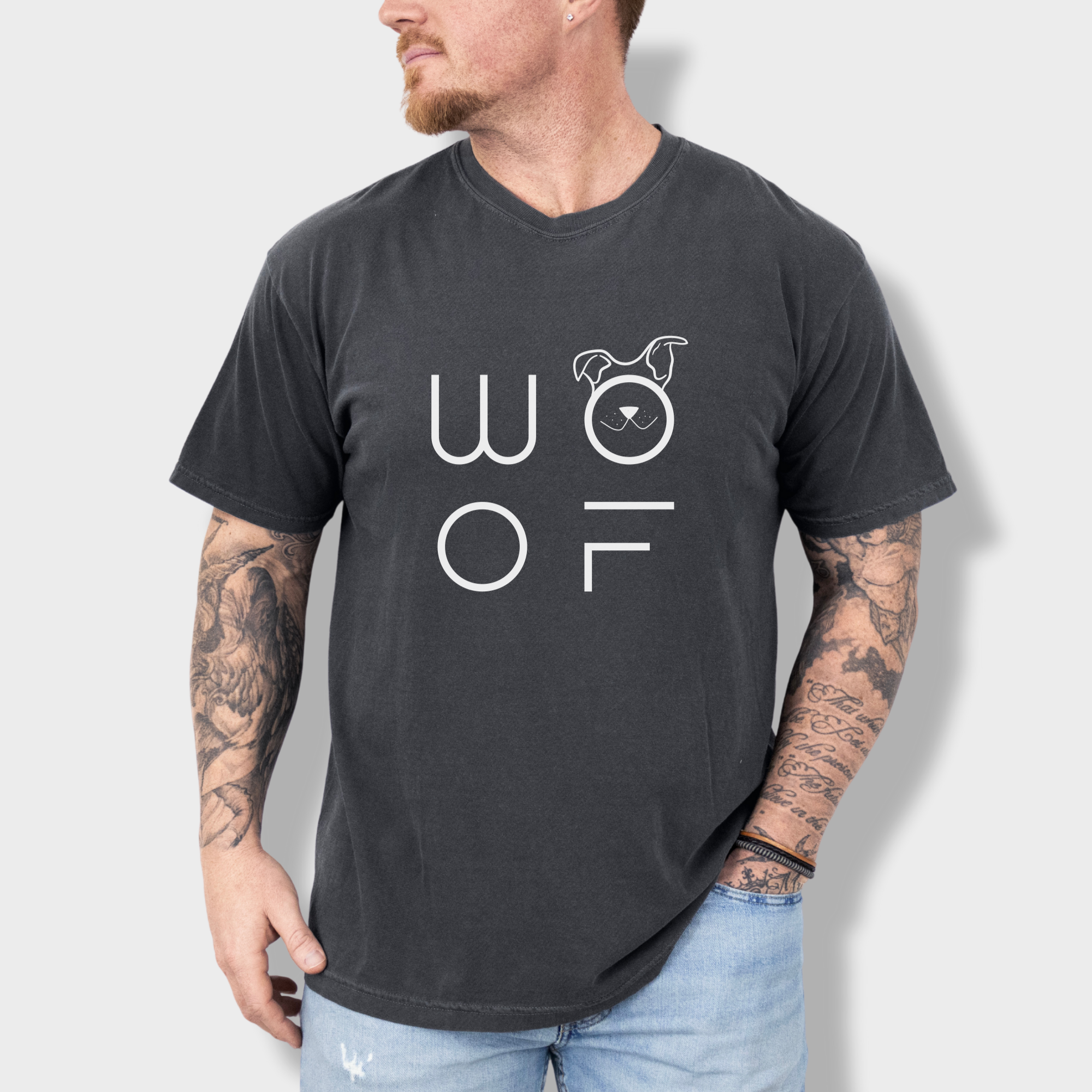 minimalist-woof-modern-text-design-dog-text-comfort-colors-t-shirt-in-pepper - Pepper Lifestyle Male Model