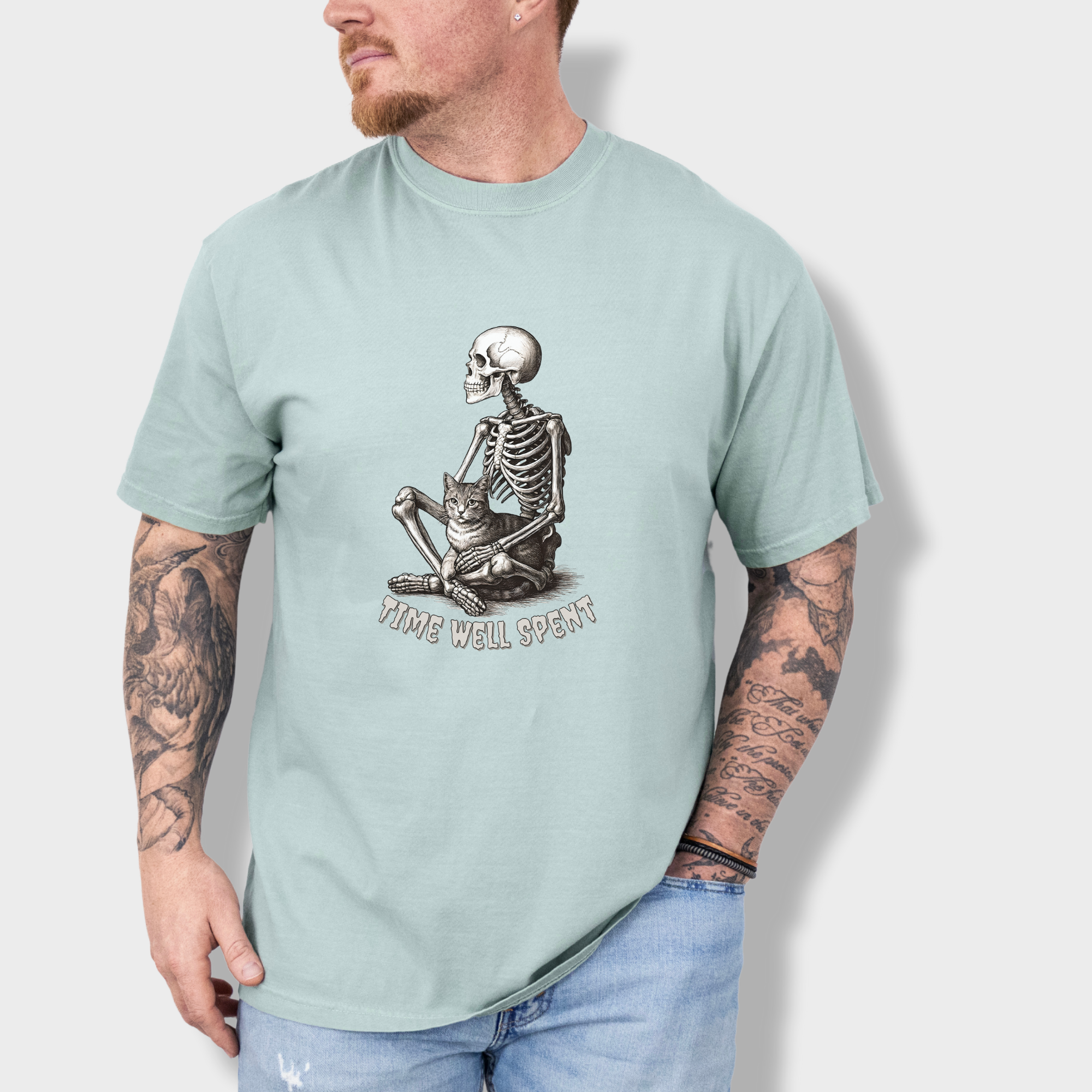 line-art-sit-still-skeleton-petting-cat-cat-skeleton-comfort-colors-t-shirt-in-granite - Granite Lifestyle Male Model