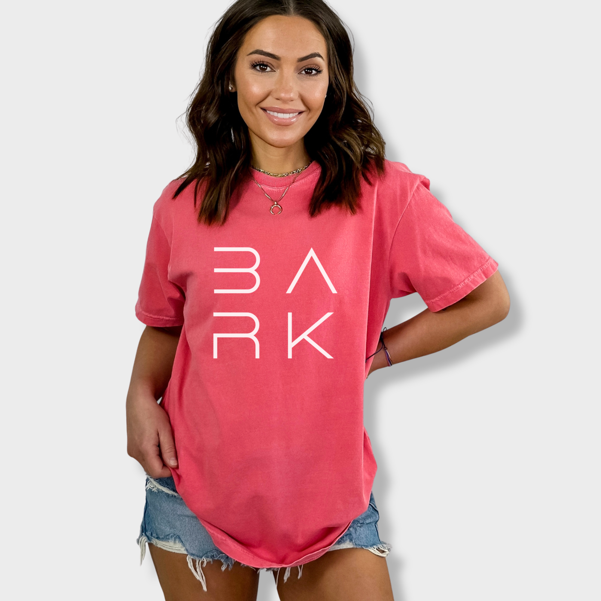 minimalist-bark-modern-text-design-dog-text-comfort-colors-t-shirt-in-watermelon - Watermelon Lifestyle Female Model