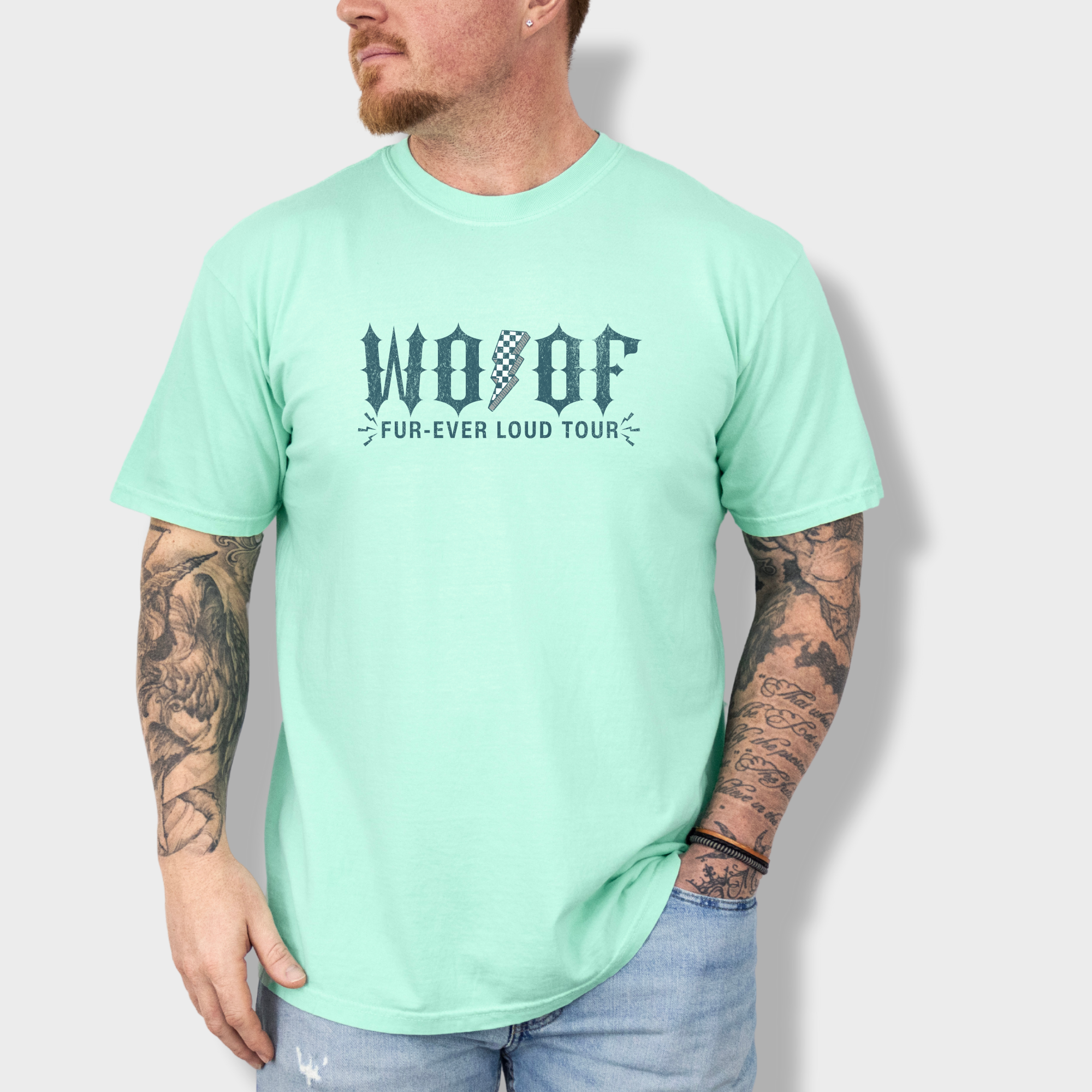 artistic-woof-furever-loud-tour-dog-graphic-comfort-colors-t-shirt-in-island-reef - Island Reef Lifestyle Male Model