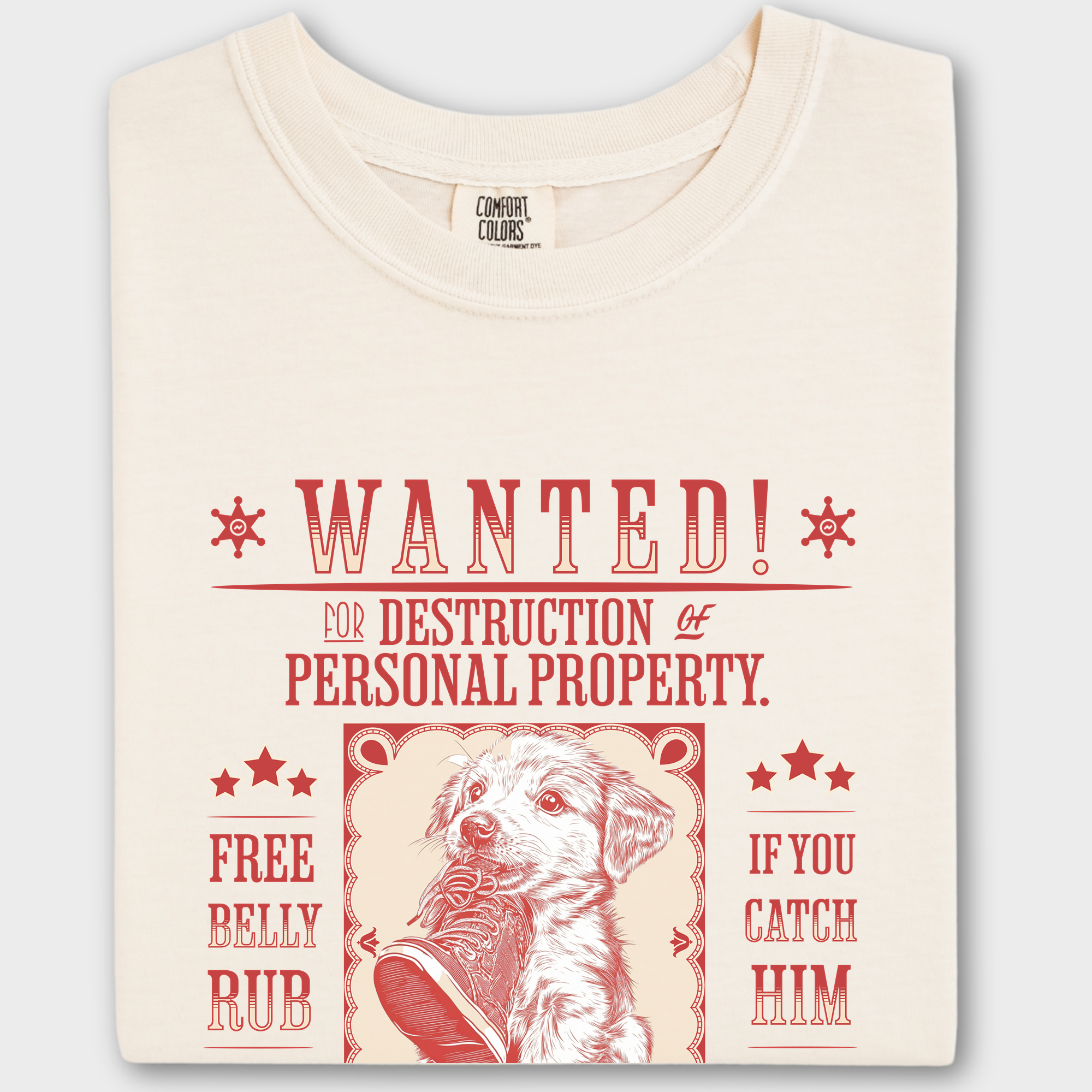 Vintage wanted poster T-shirt featuring a mischievous puppy chewing a shoe, wanted for destruction of property.
