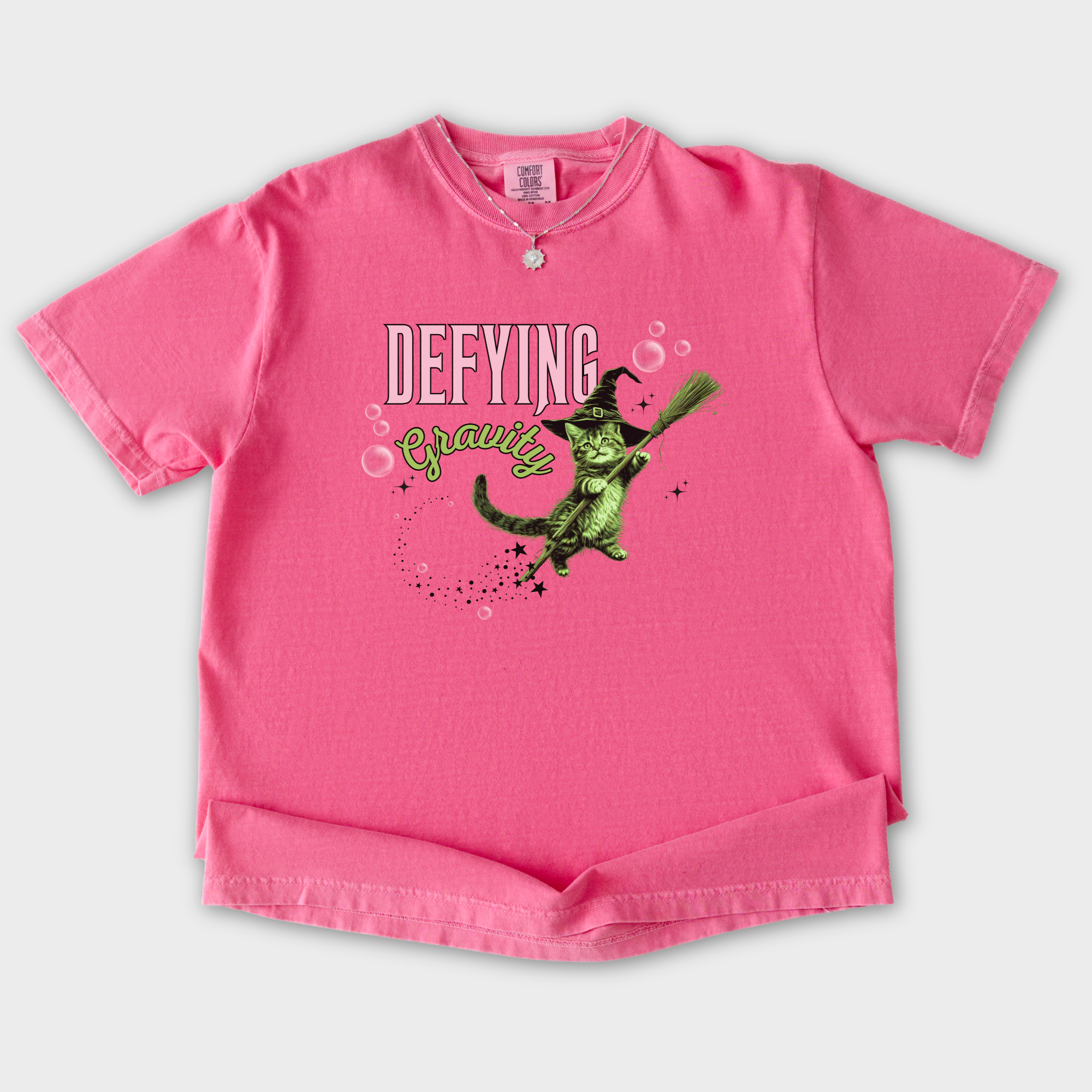 Retro Cute Cat Graphic Defying Gravity Wicked-Inspired T-Shirt in Crunchberry