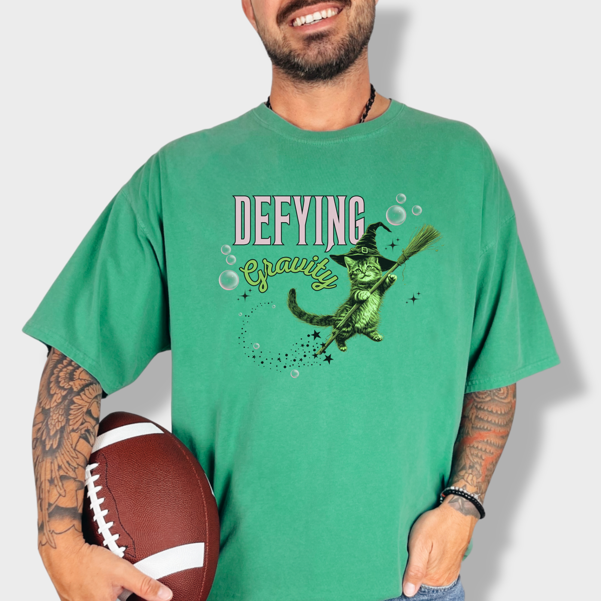 Retro Cute Cat Graphic Defying Gravity Wicked-Inspired T-Shirt in Grass-Fetch N Found