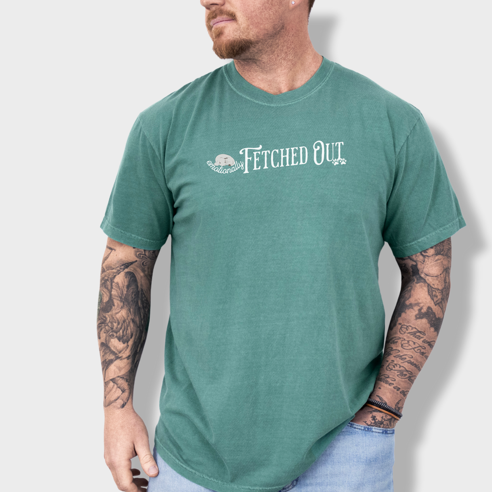 Funny dog lover’s T-shirt with the witty phrase 'Emotionally Fetched Out,' perfect for exhausted pet parents.