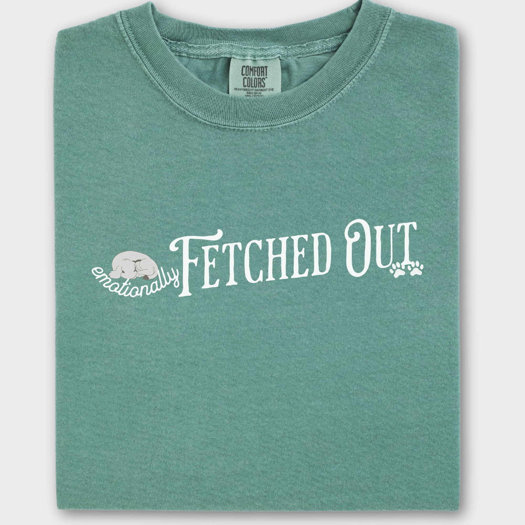 Minimalist dog-themed graphic tee with the phrase 'Emotionally Fetched Out,' blending humor and pet parent life.