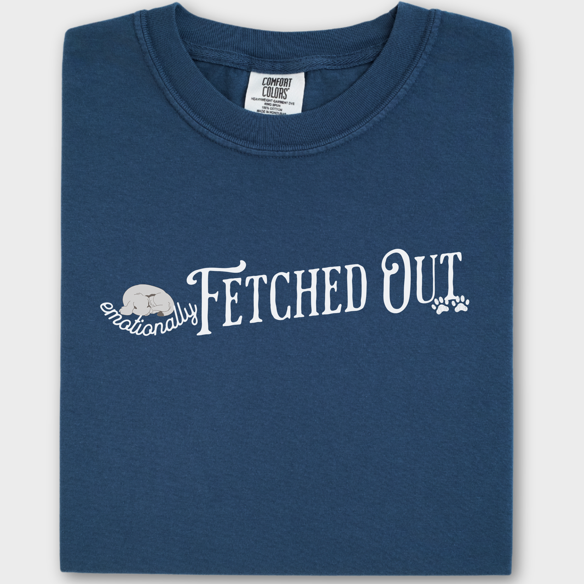 Minimalist dog-themed graphic tee with the phrase 'Emotionally Fetched Out,' blending humor and pet parent life.