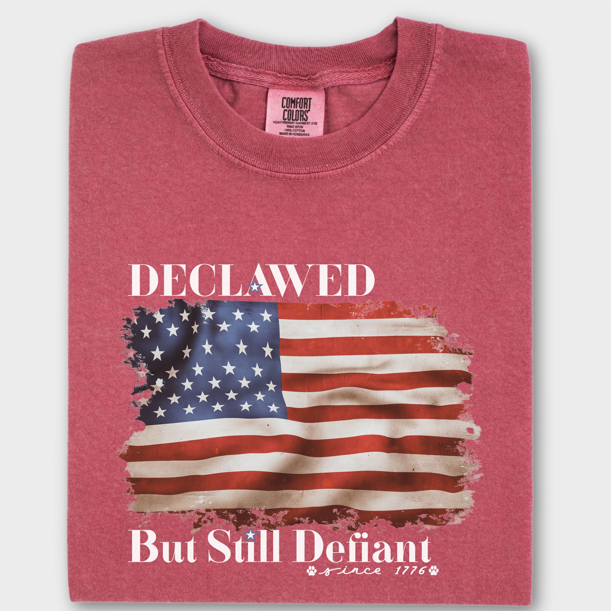 Vintage Declawed but Still Defiant Fourth of July United States Flag Cat Graphic Comfort Colors T-Shirt in Crimson