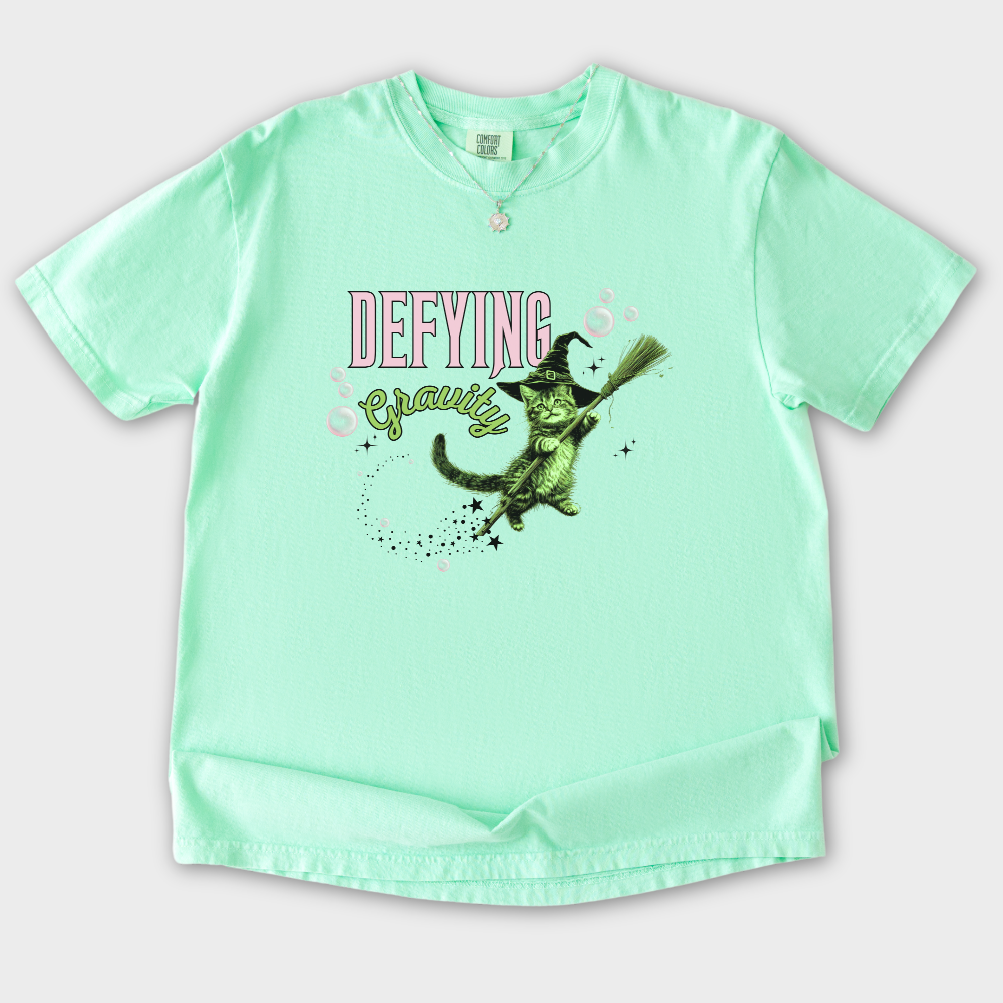 Retro Cute Cat Graphic Defying Gravity Wicked-Inspired T-Shirt in Island Reef