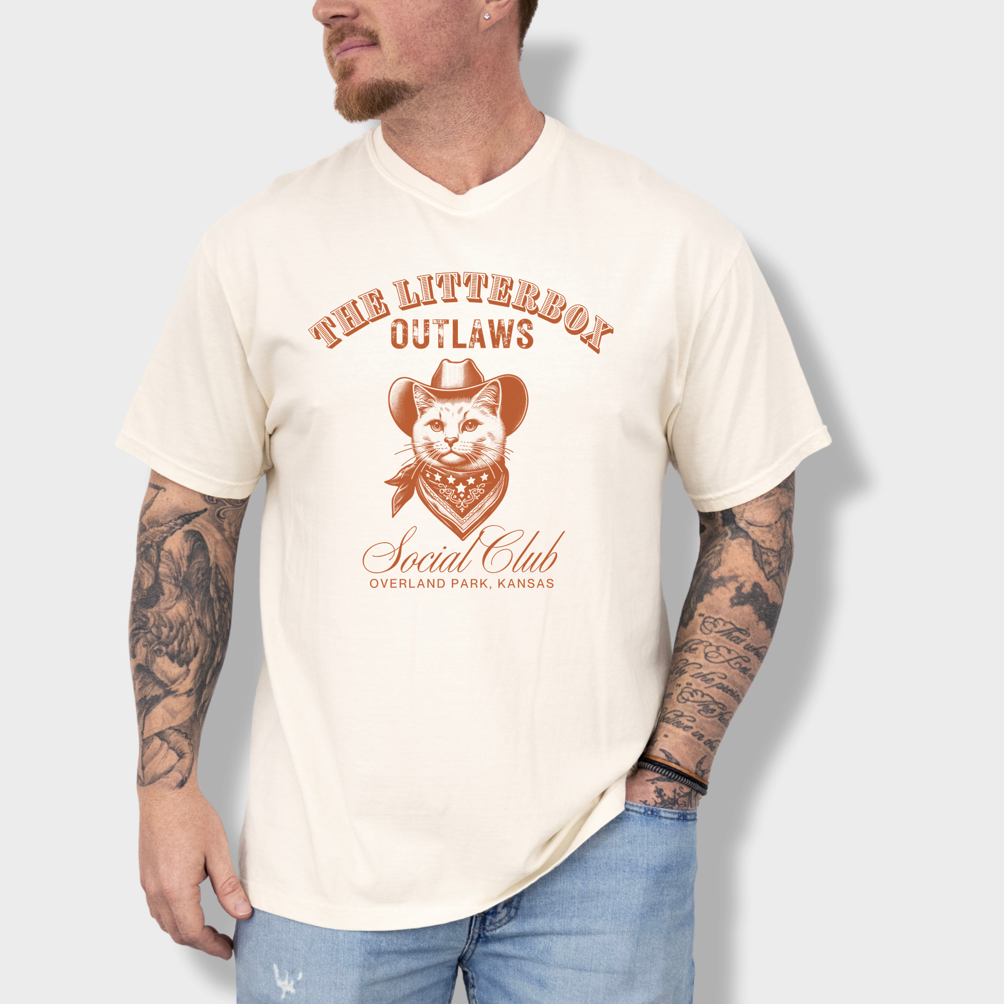 Retro cowboy cat T-shirt for cat lovers, featuring a stylish feline outlaw with a custom city and state design