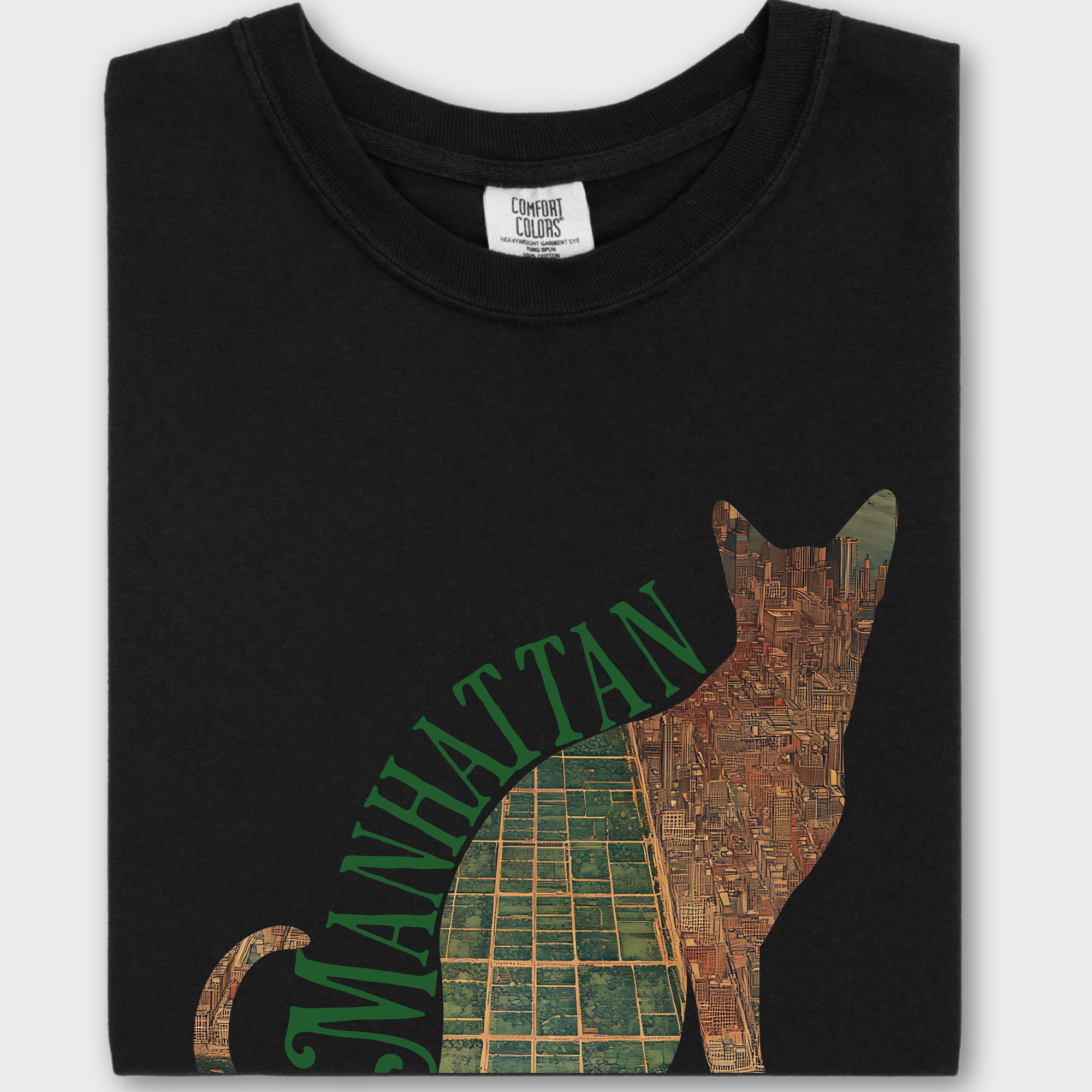 Retro-inspired cat lover’s T-shirt showcasing a detailed vintage map of NYC shaped like a feline silhouette.