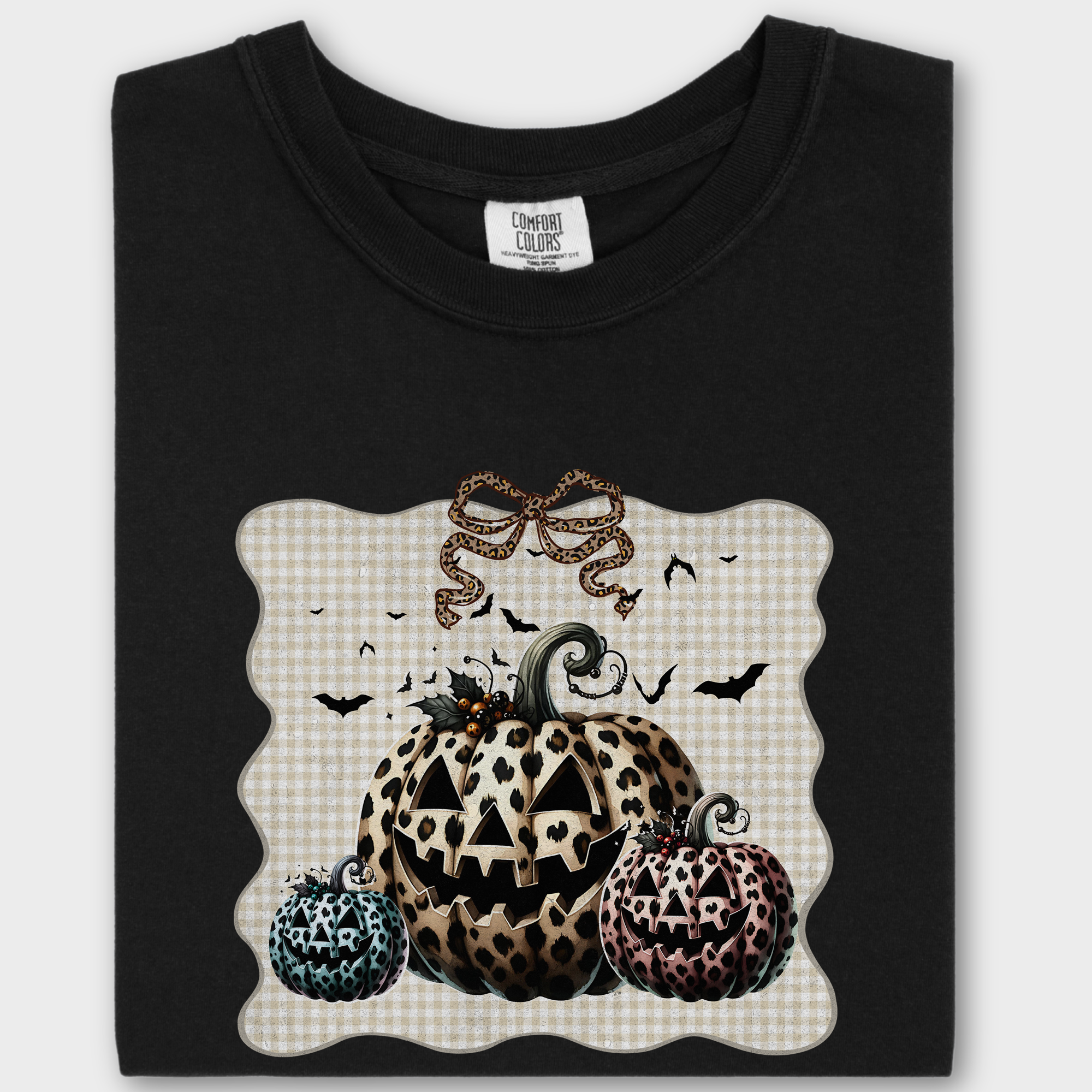 Western Preppy Leopard Print Jack-O-Lanterns Cat Bow Comfort Colors T-Shirt in Black
