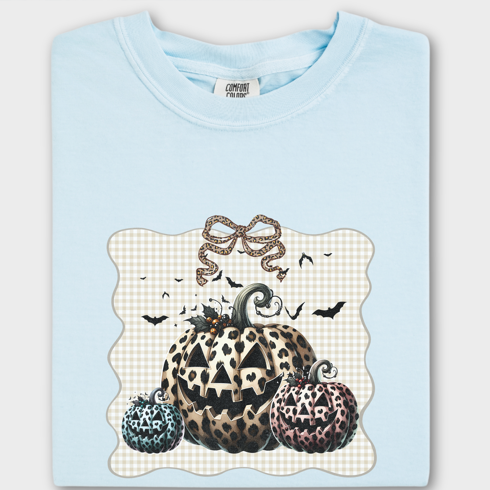 Western Preppy Leopard Print Jack-O-Lanterns Cat Bow Comfort Colors T-Shirt in Chambray