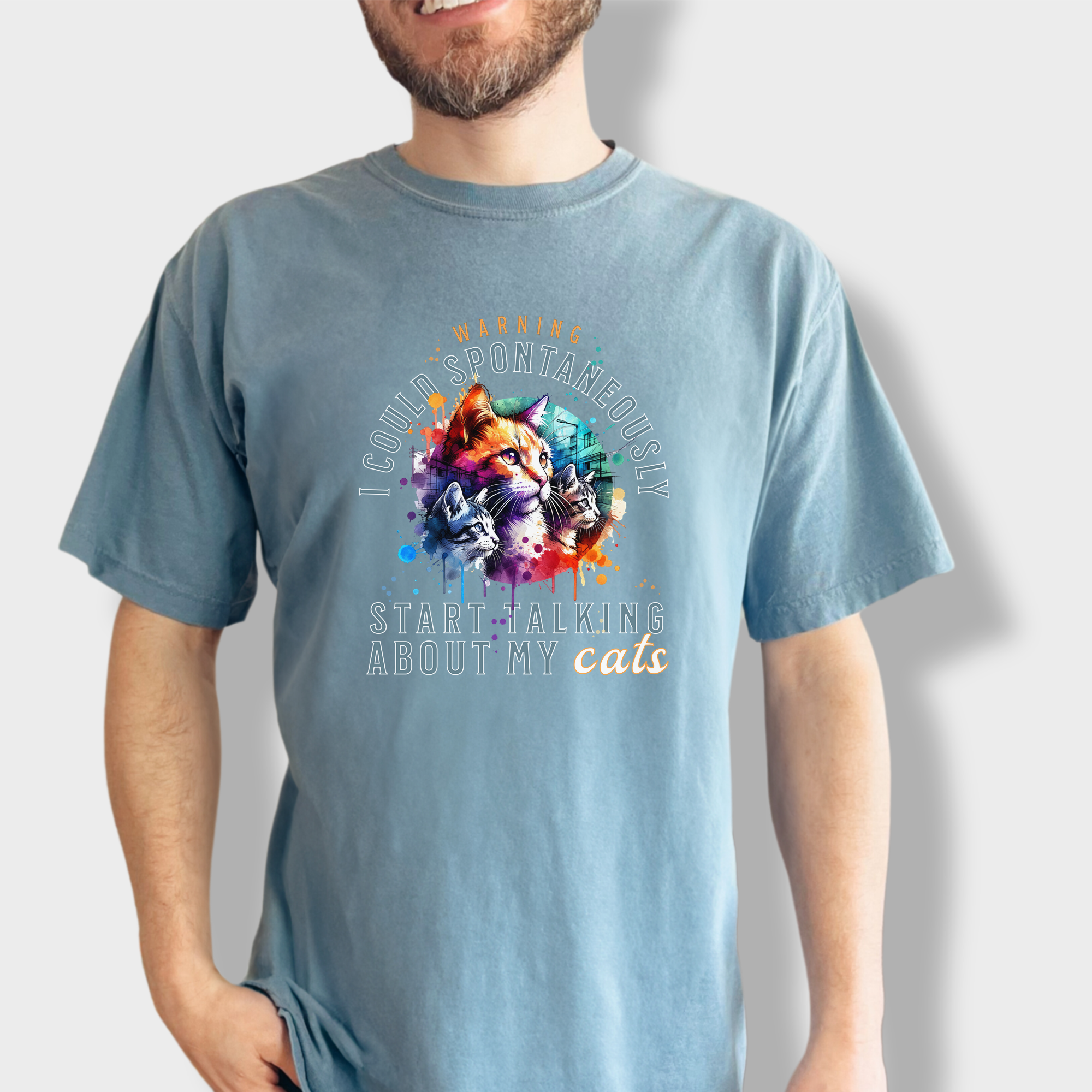 Soft cotton T-shirt showcasing a large cat graphic with a playful text warning for passionate cat owners.