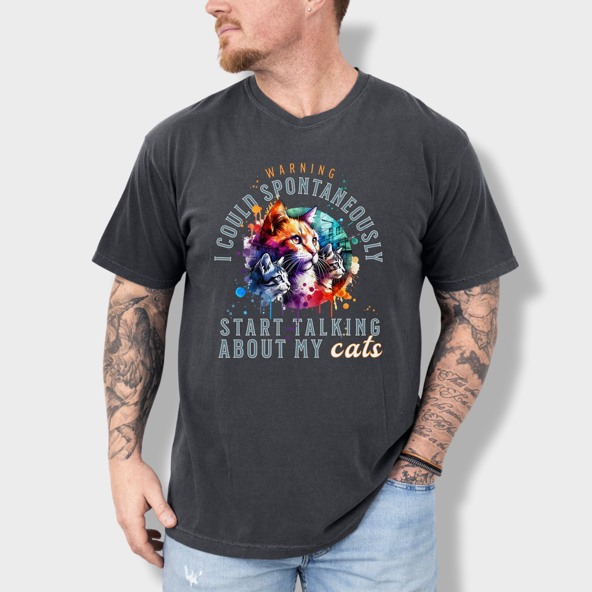 Retro bootleg-style cat T-shirt featuring a bold cat graphic with the humorous phrase 'Warning. I may spontaneously start talking about my cats.