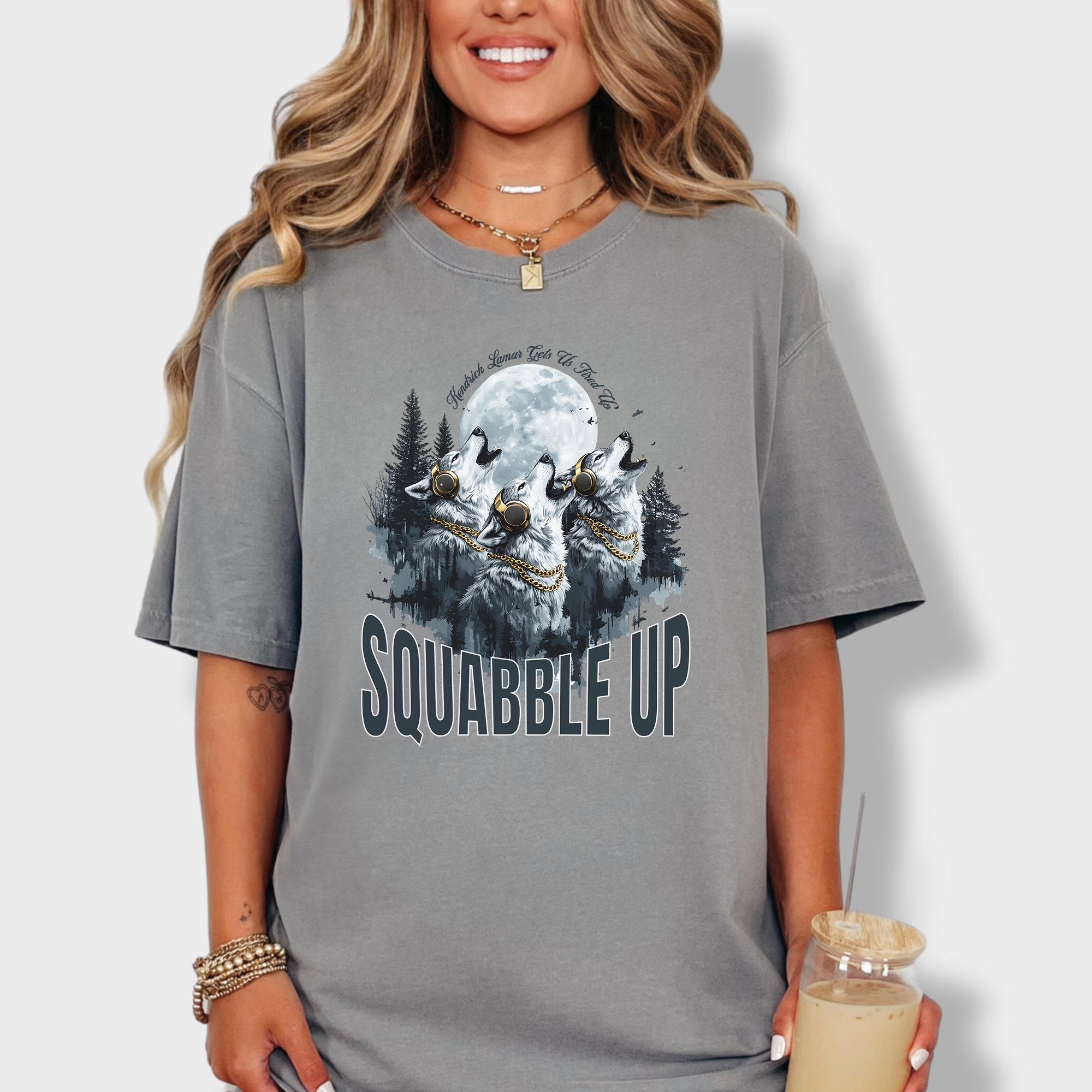 Retro-style wolf tee with a pack of howling wolves in headphones and bold 'Squabble Up' lettering, perfect for hip-hop and nature lovers.