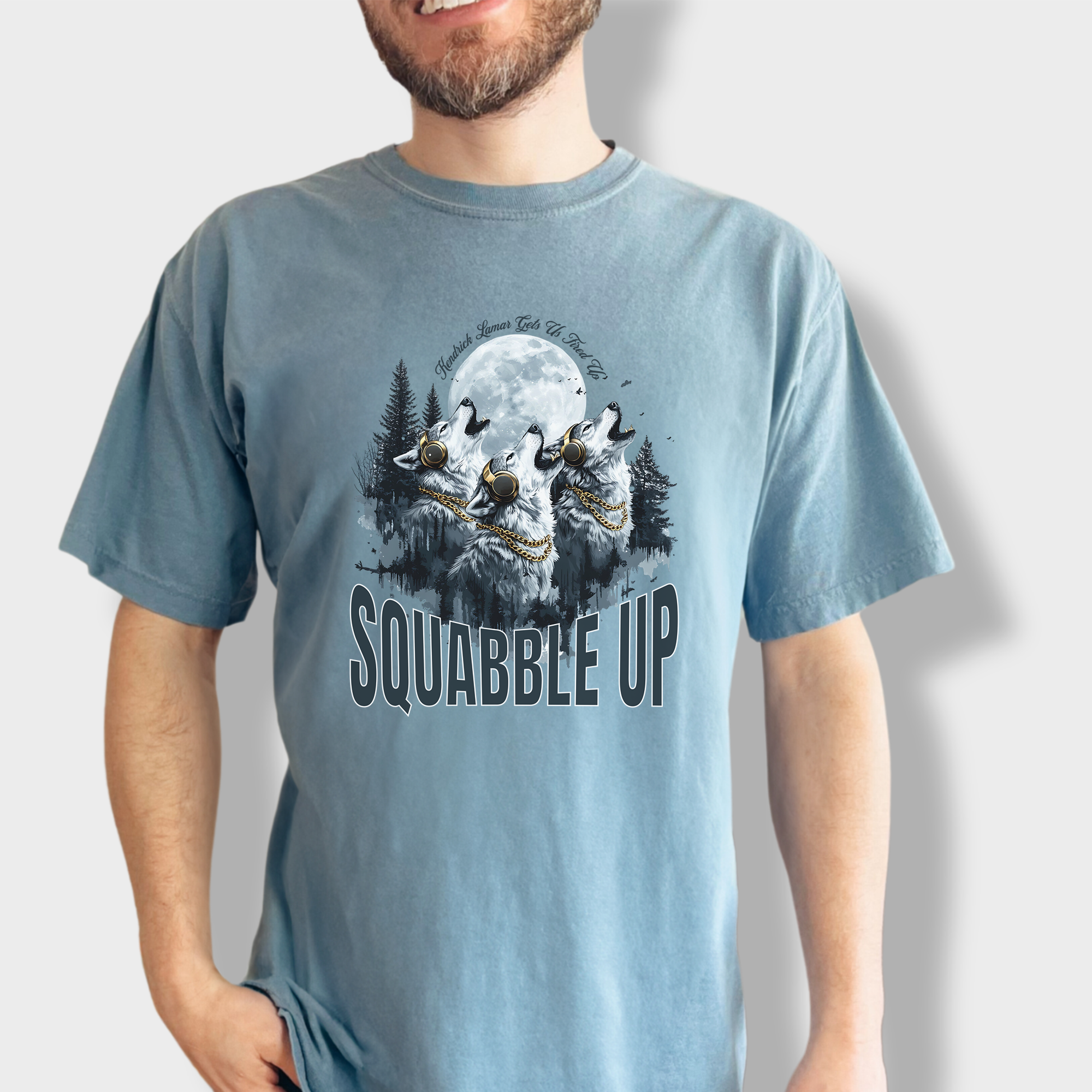 Graphic wolf pack T-shirt featuring wolves howling at the moon with headphones, inspired by Kendrick Lamar's 'Squabble Up'.