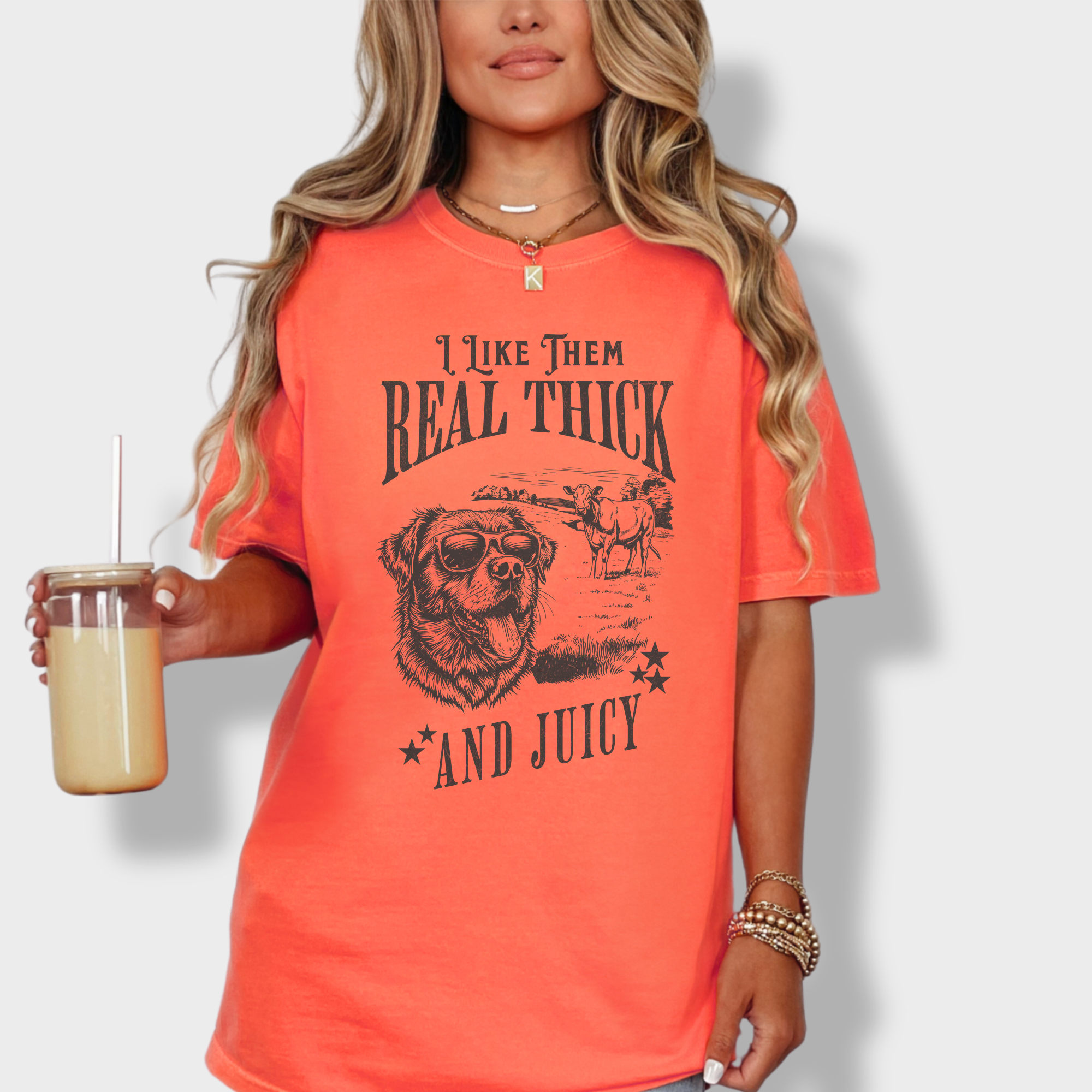 Minimalist line-art dog and cow graphic tee with humorous text, nodding to 90s hip-hop lyrics.