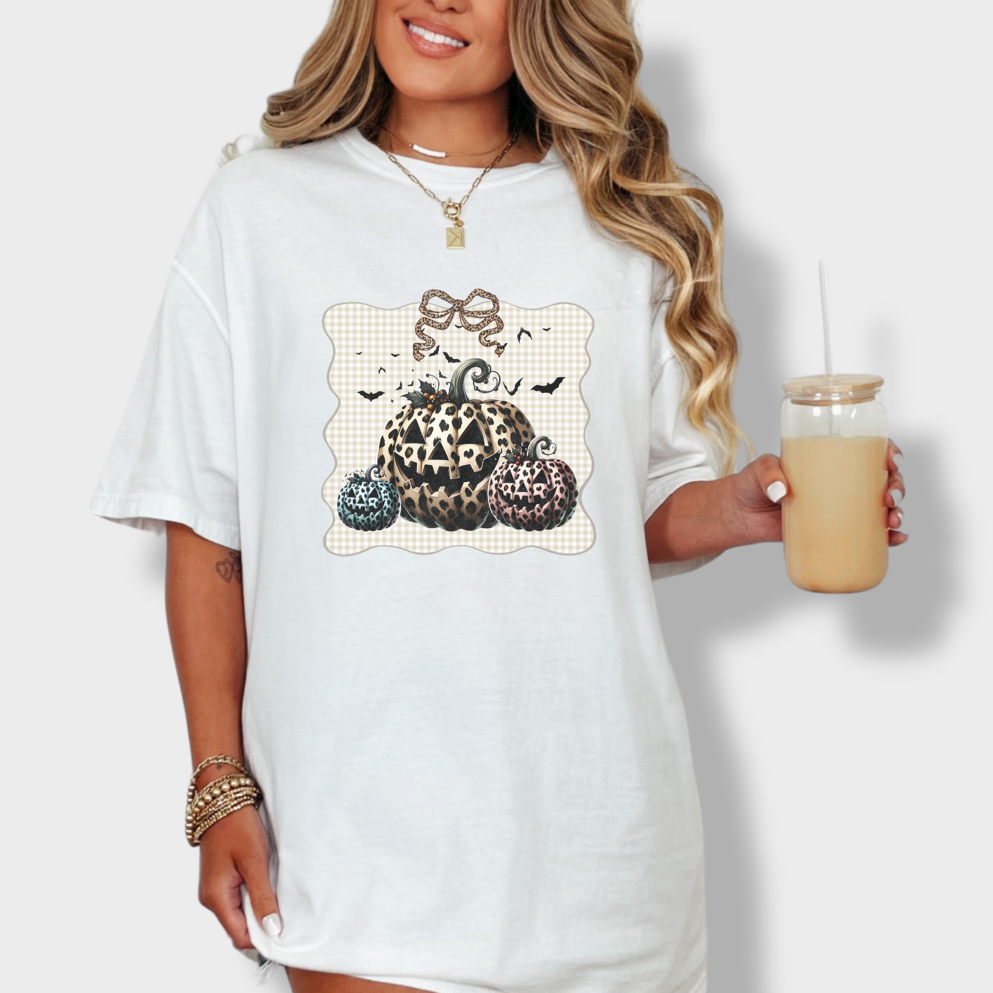 western-preppy-leopard-print-jack-o-lanterns-cat-bow-comfort-colors-t-shirt-in-white - White Lifestyle Female Model