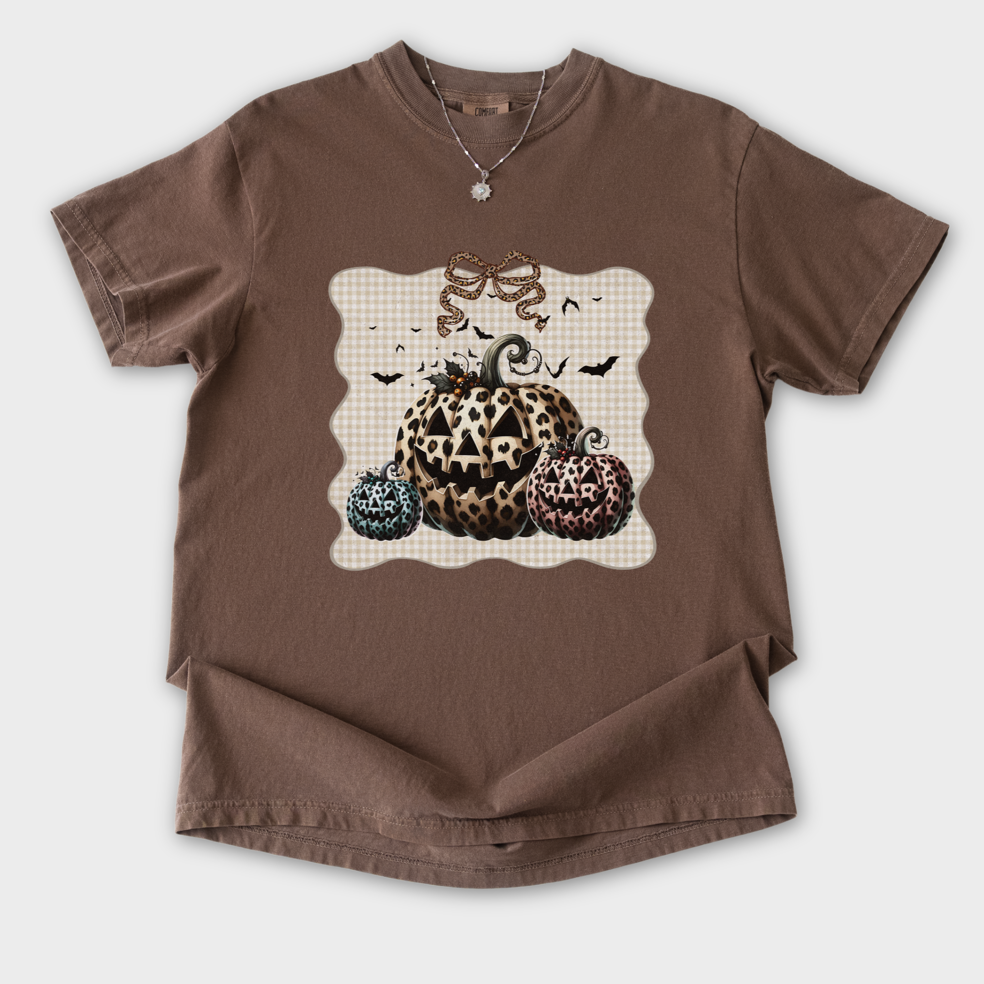western-preppy-leopard-print-jack-o-lanterns-cat-bow-comfort-colors-t-shirt-in-espresso - Espresso Flat Lay Front