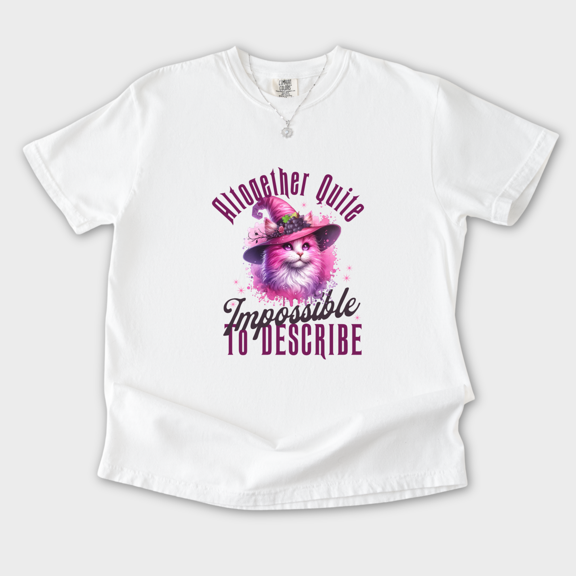 pink-wicked-impossible-to-describe-t-shirt-1-in-white - White Flat Lay Front