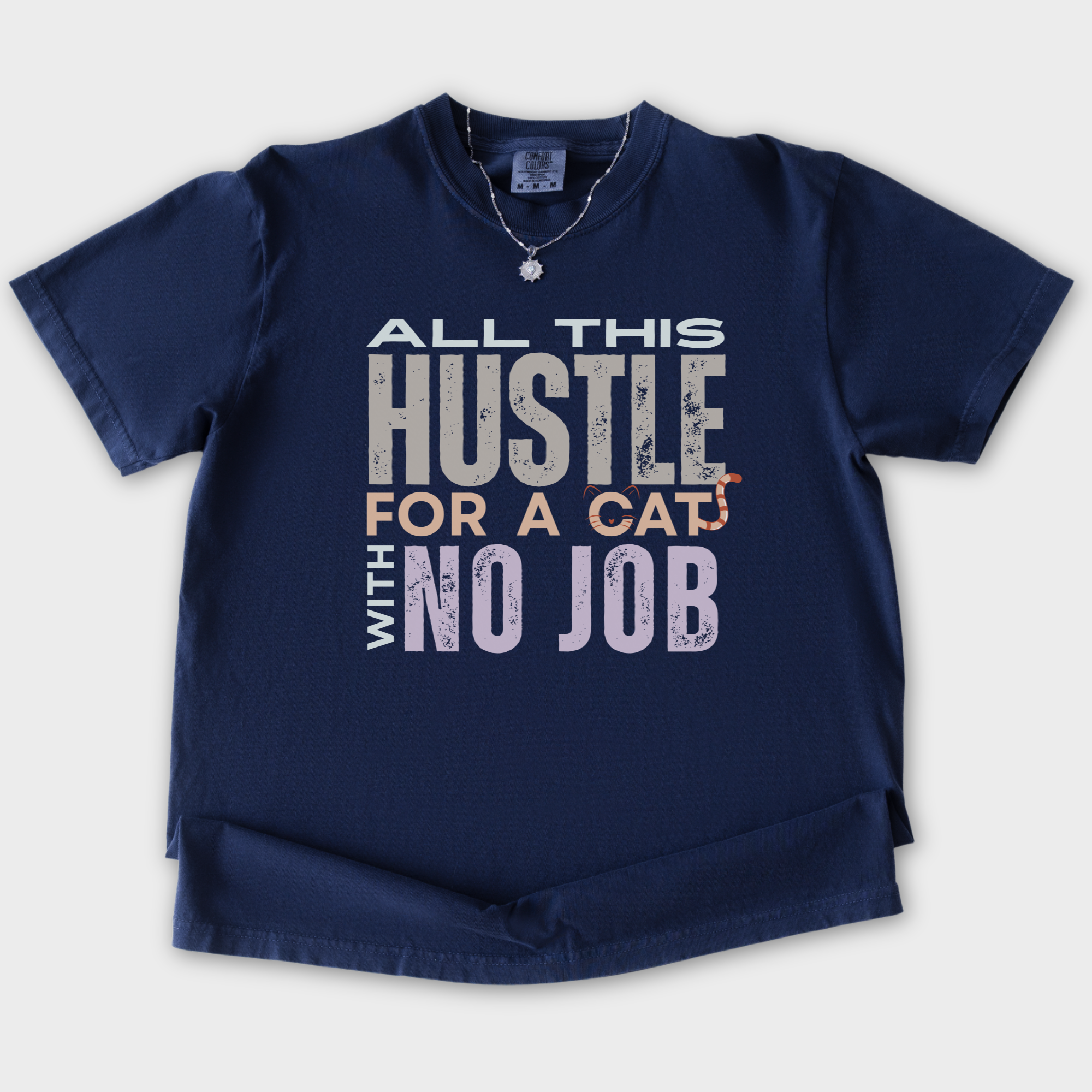 vintage-hustle-cat-with-no-job-cat-text-comfort-colors-t-shirt-in-true-navy - True Navy Flat Lay Front
