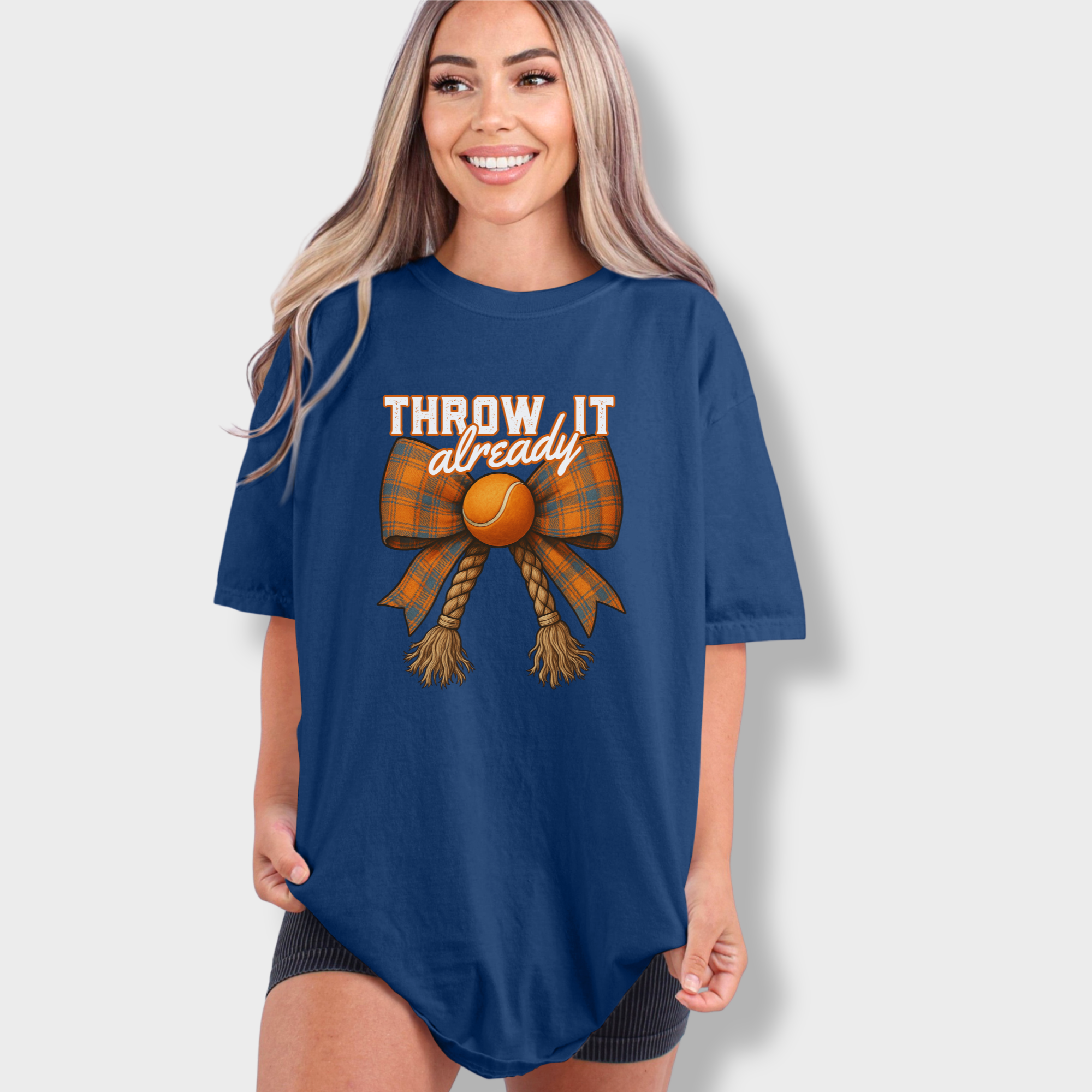 western-throw-it-already-dog-chew-toy-bow-dog-bow-comfort-colors-t-shirt-in-midnight - Midnight Lifestyle Female Model