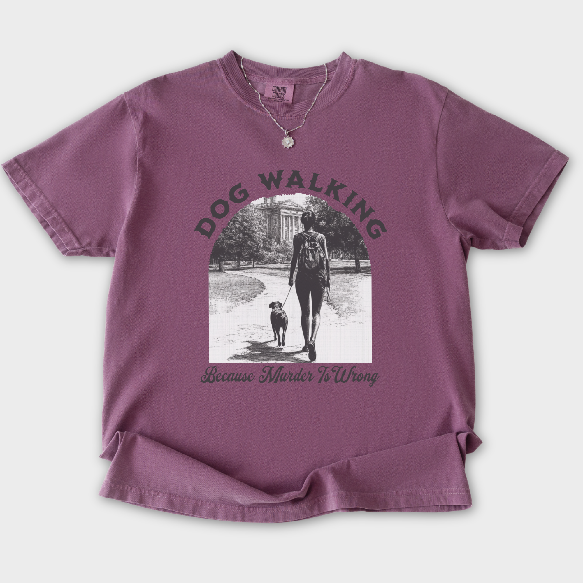 western-murder-is-wrong-dog-graphic-comfort-colors-t-shirt-in-berry - Berry Flat Lay Front