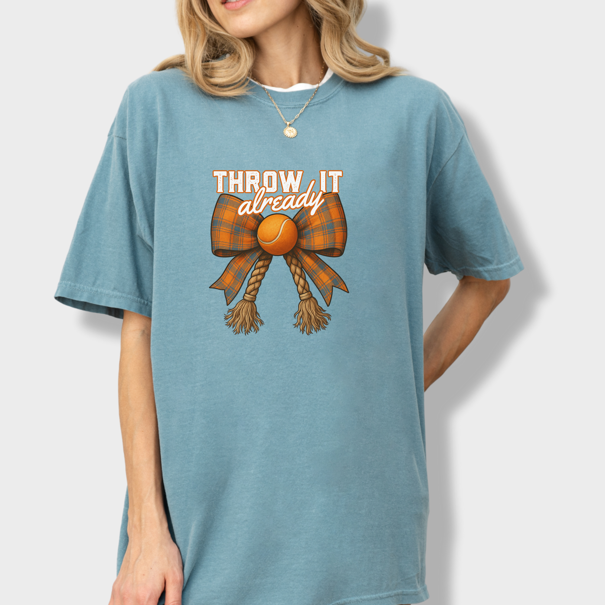 western-throw-it-already-dog-chew-toy-bow-dog-bow-comfort-colors-t-shirt-in-ice-blue - Ice Blue Lifestyle Female Model