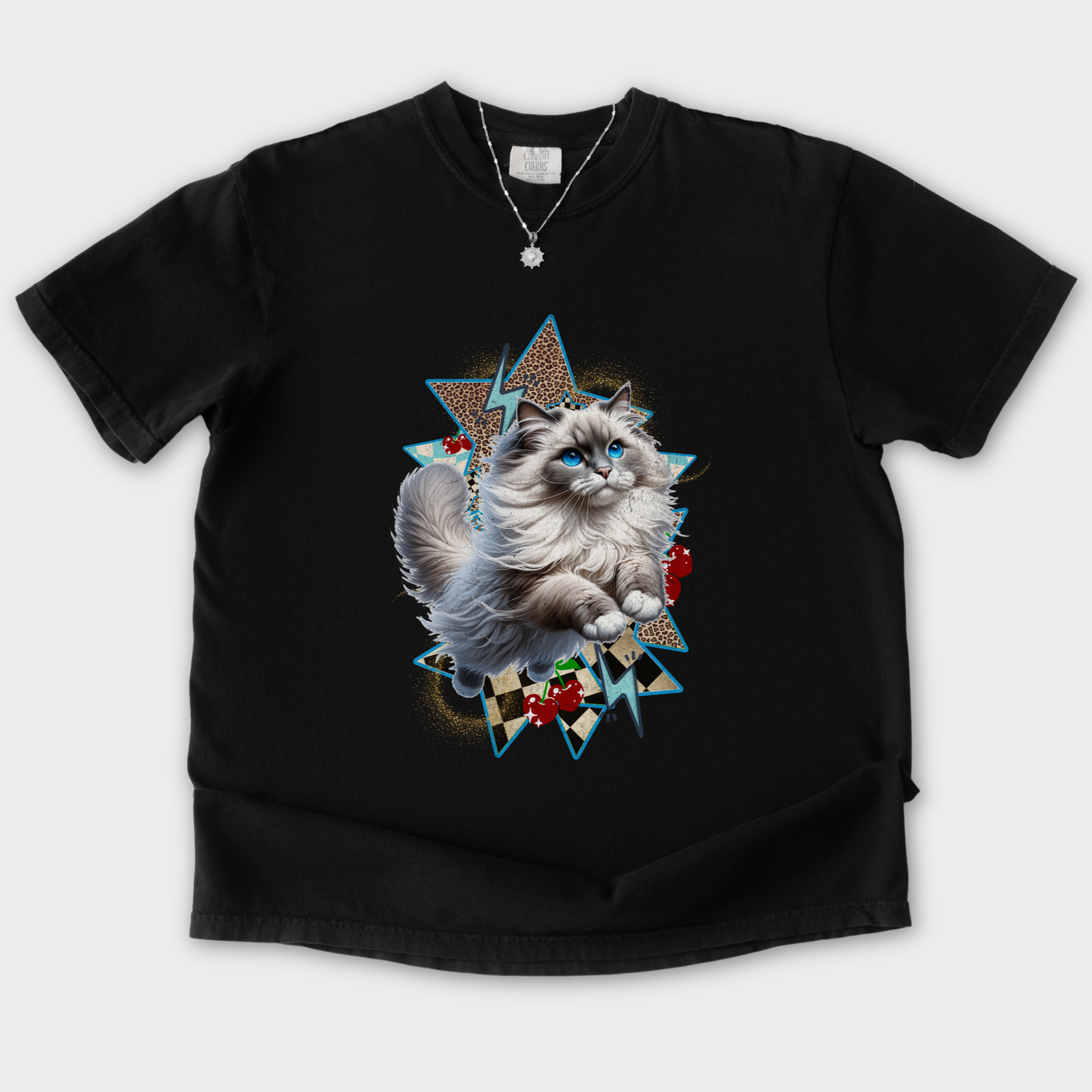 artistic-y2k-catcore-leaping-ragdoll-cat-cherry-comfort-colors-t-shirt-in-black - Black Flat Lay Front