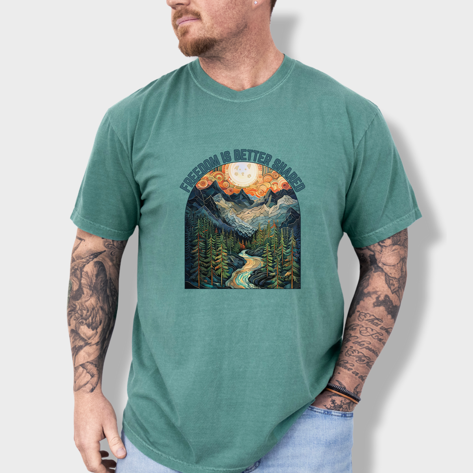 artistic-mountain-freedom-is-better-shared-stained-glass-version-dog-graphic-comfort-colors-t-shirt-in-light-green - Light Green Lifestyle Male Model